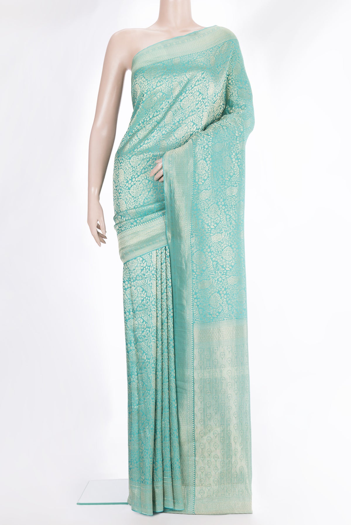 Turquoise Dual Tone Banarasi Georgette Saree with Zari Brocade on the body and Zari Border.  displayed on a mannequin