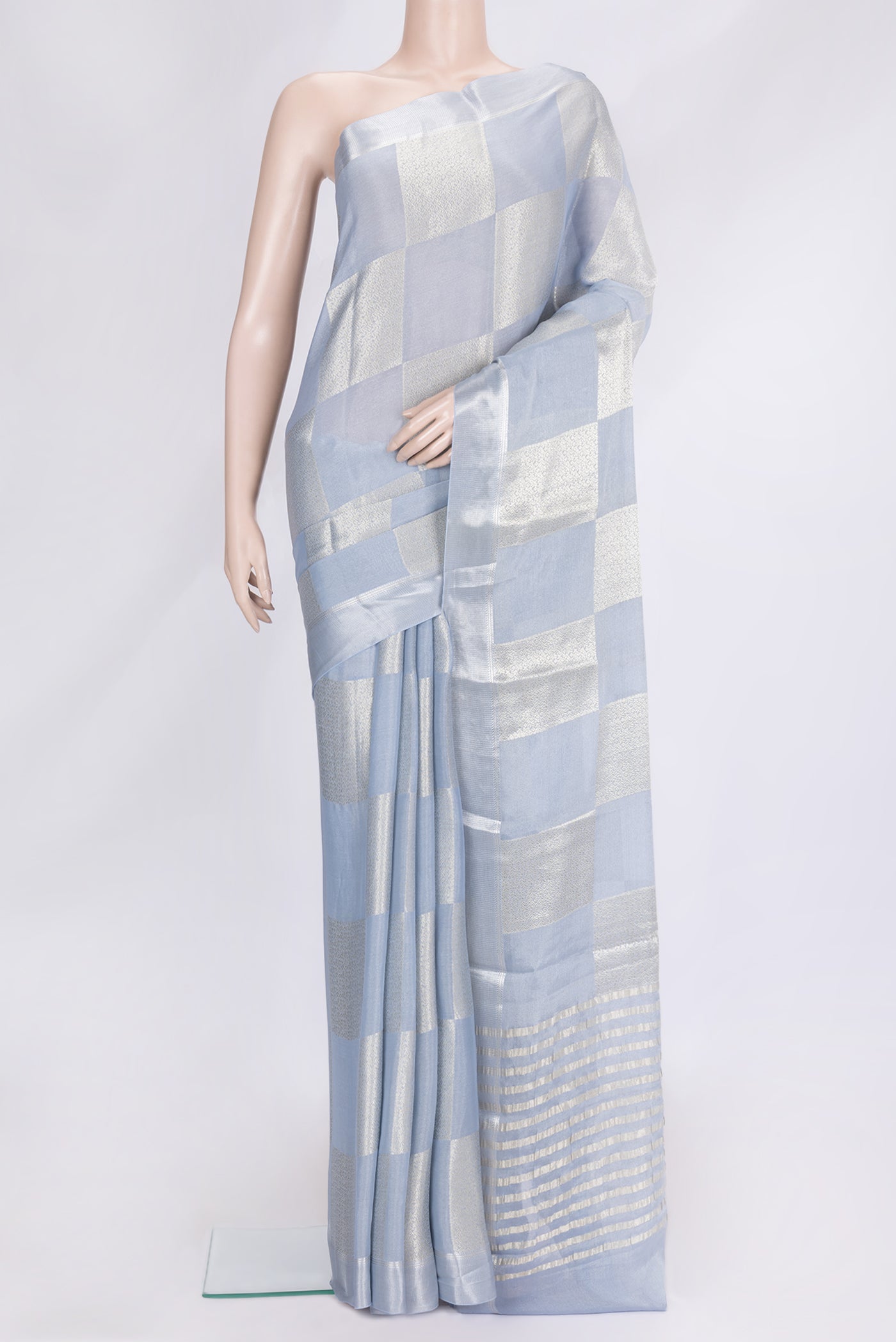 Grey Dual Tone Mysore Georgette Saree with Zari Brocade on the body and Zari Border.  displayed on a mannequin