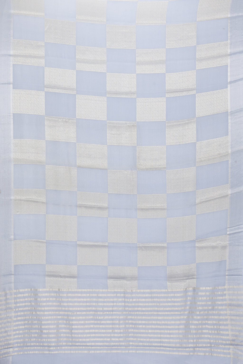 Flat view of Grey Dual Tone Mysore Georgette Saree with Zari Brocade on the body and Zari Border. 
