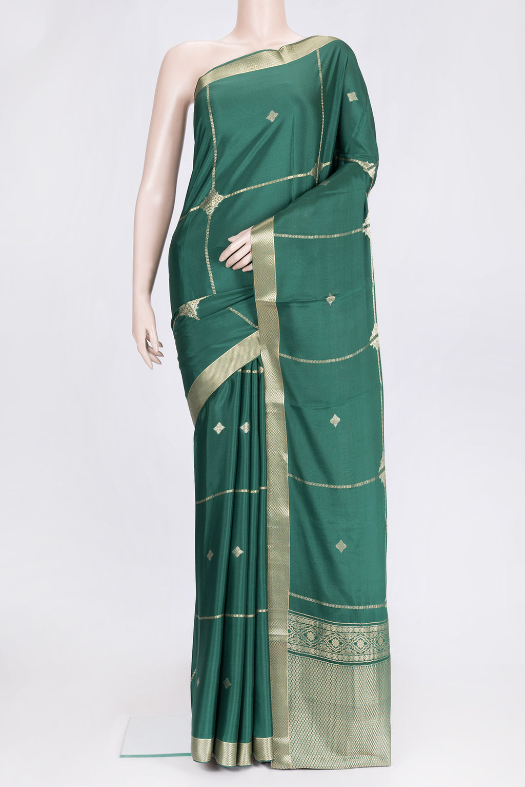 Bottle Green Dual Tone Mysore Silk Saree with Zari Butta on the body and Zari Border.  displayed on a mannequin