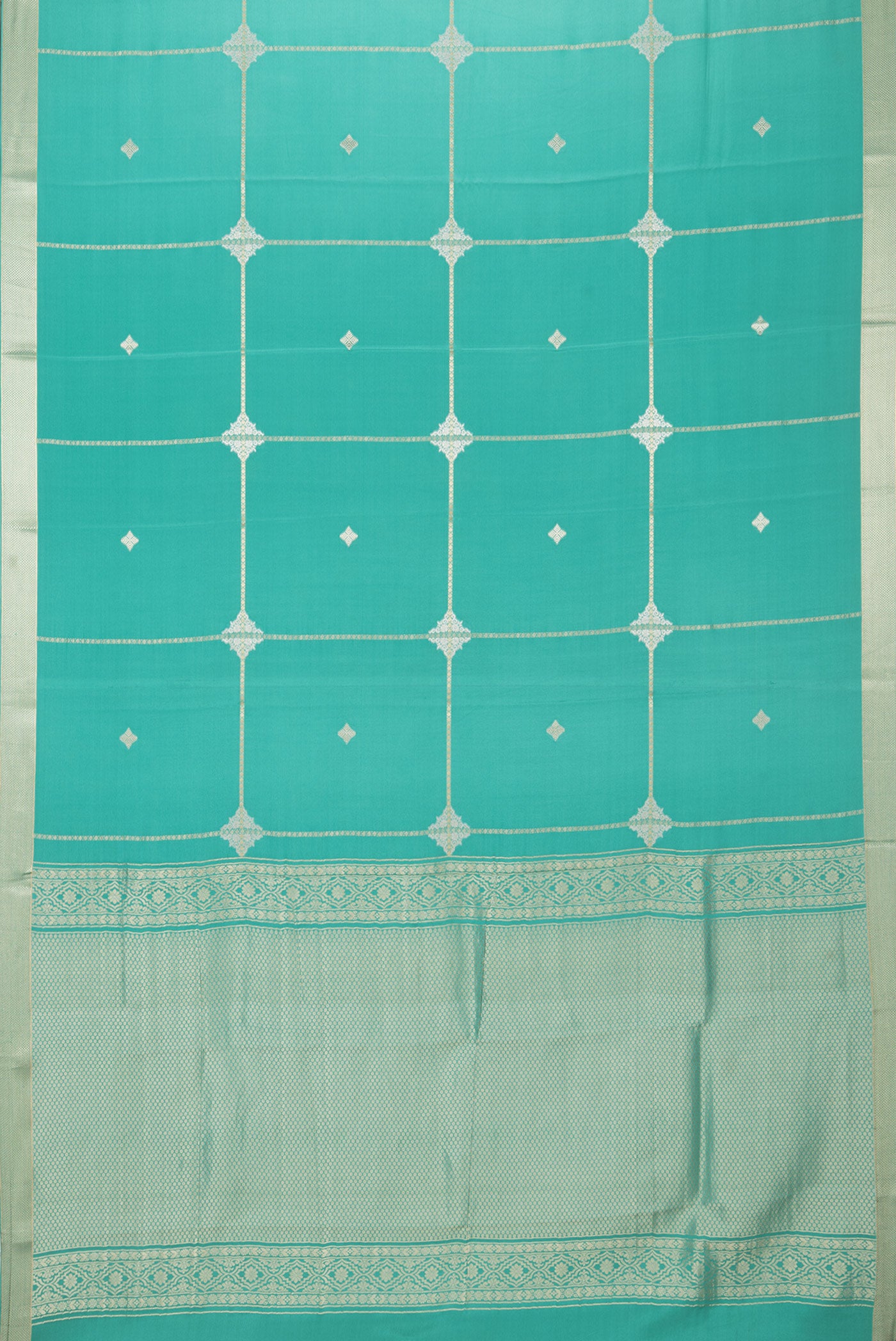 Flat view of Teal Mysore Silk Saree with Zari Butta on the body and Zari Border. 