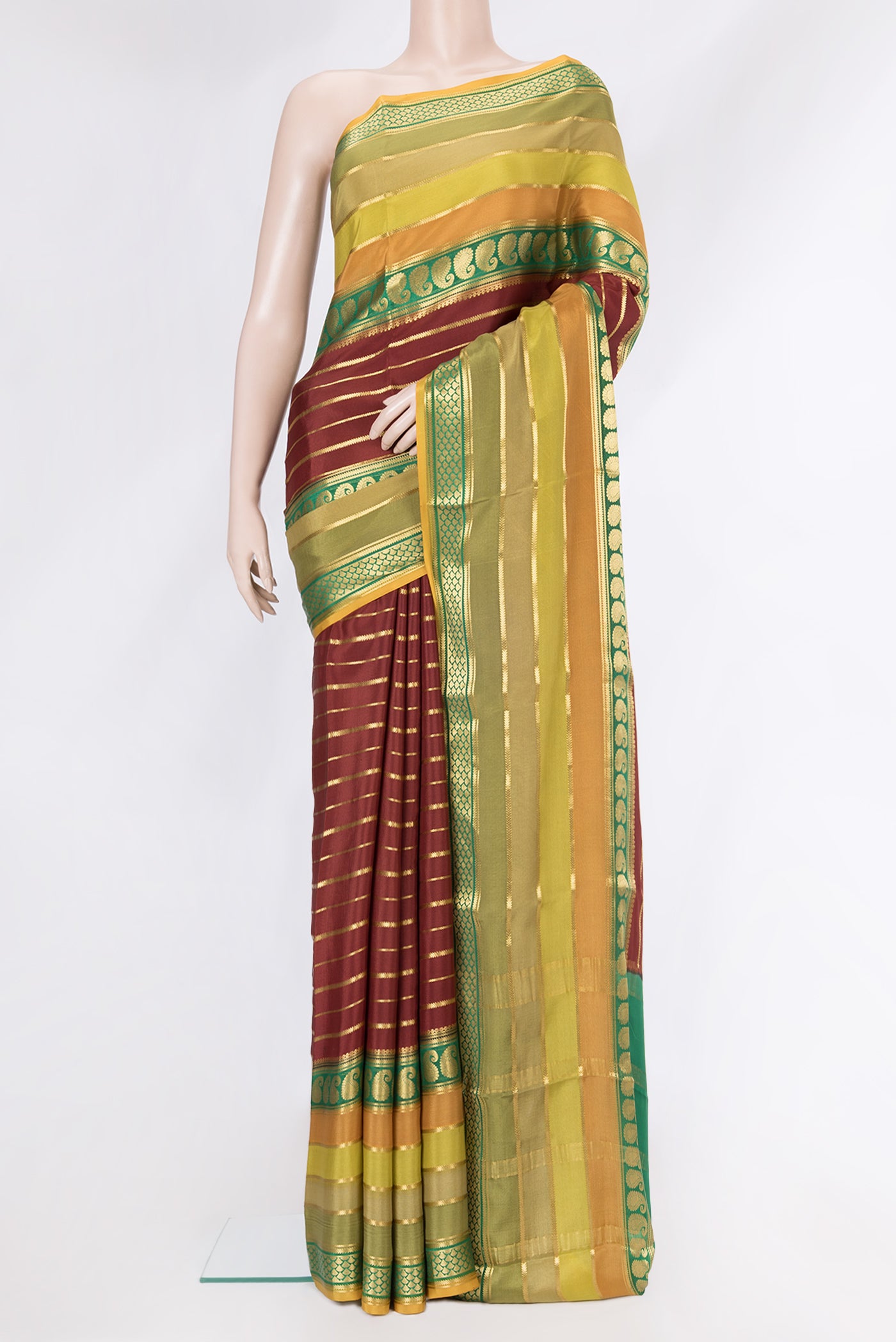 Maroon Dual Tone Mysore Silk Saree with Stripes on the body and Zari Border.  displayed on a mannequin