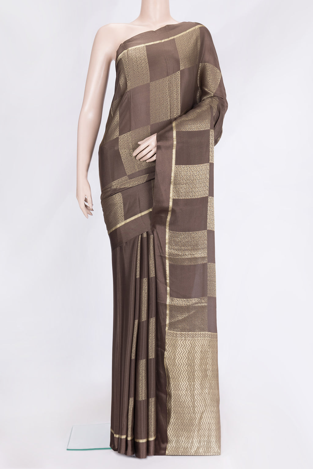 Brown Dual Tone Mysore Georgette Saree with Zari Brocade on the body and Zari Border.  displayed on a mannequin