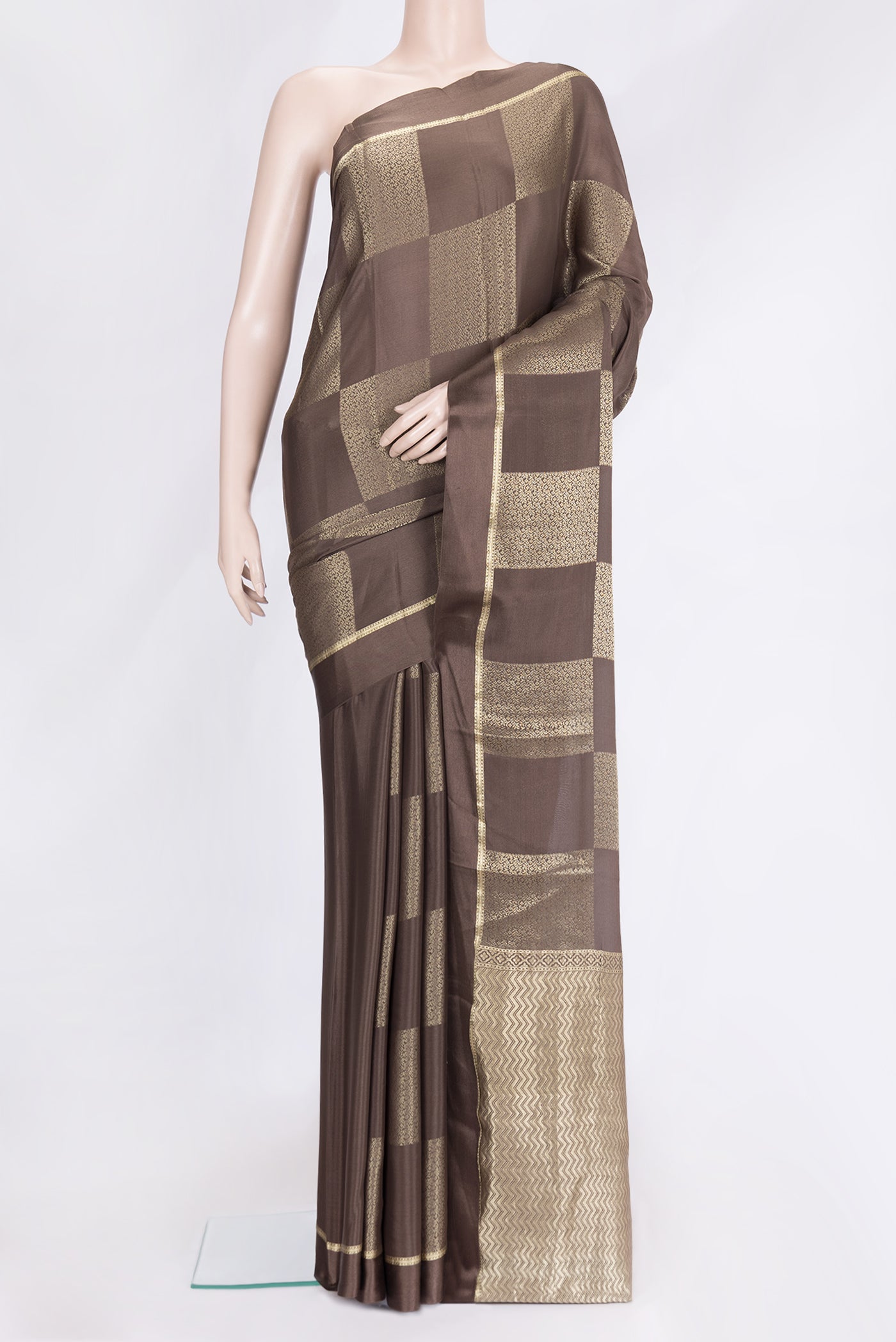 Brown Dual Tone Mysore Georgette Saree with Zari Brocade on the body and Zari Border.  displayed on a mannequin