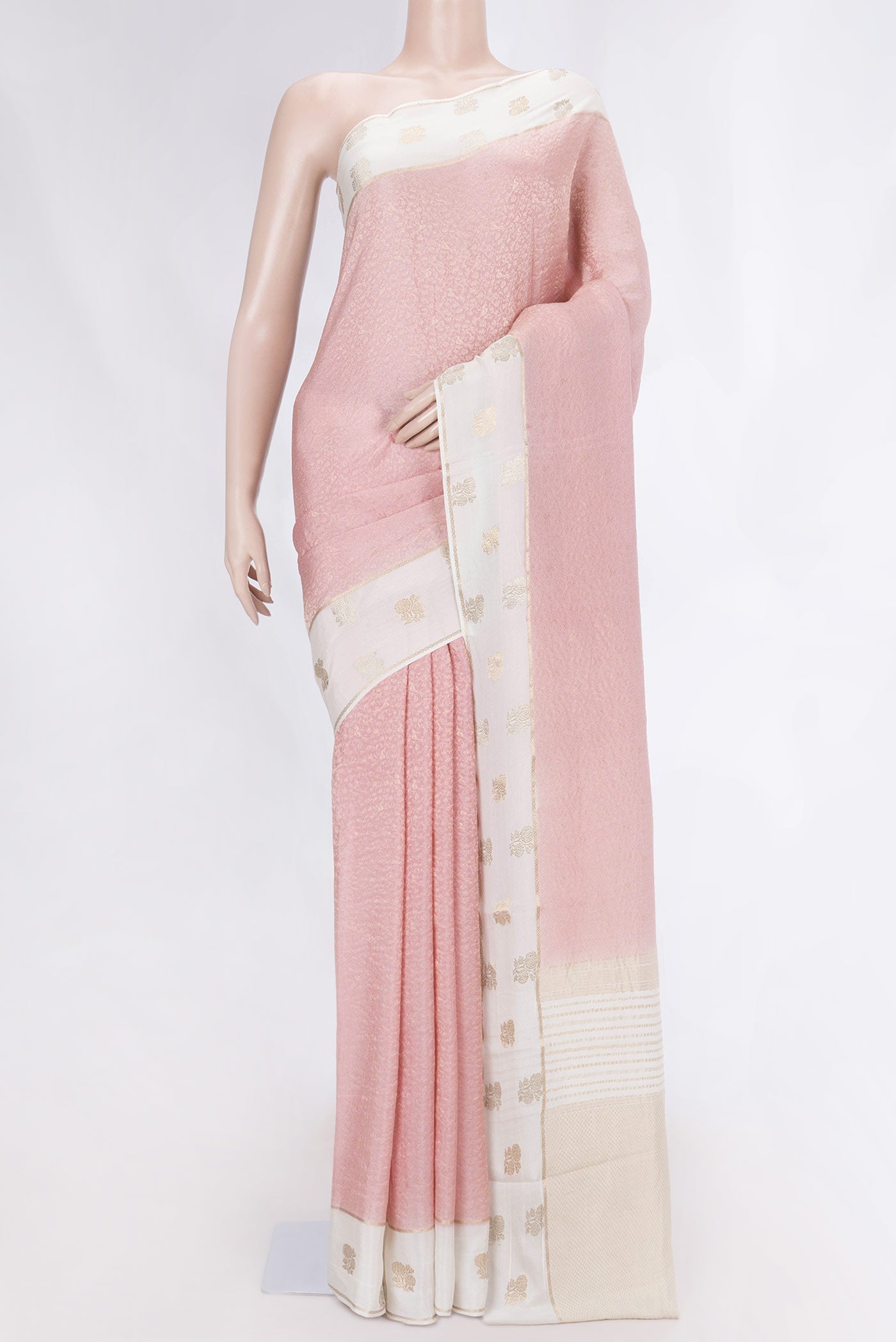 Rose pink Mysore Crepe Saree with Zari Brocade on the body and Zari Border displayed on a mannequin