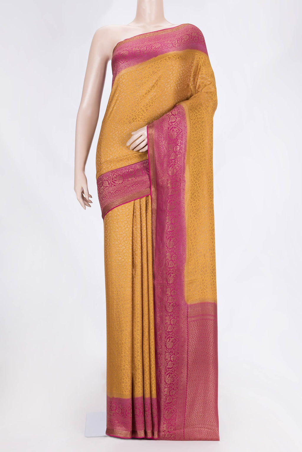 Mustard Dual Tone Banarasi Silk Saree with Zari Brocade on the body and Zari Border.  displayed on a mannequin