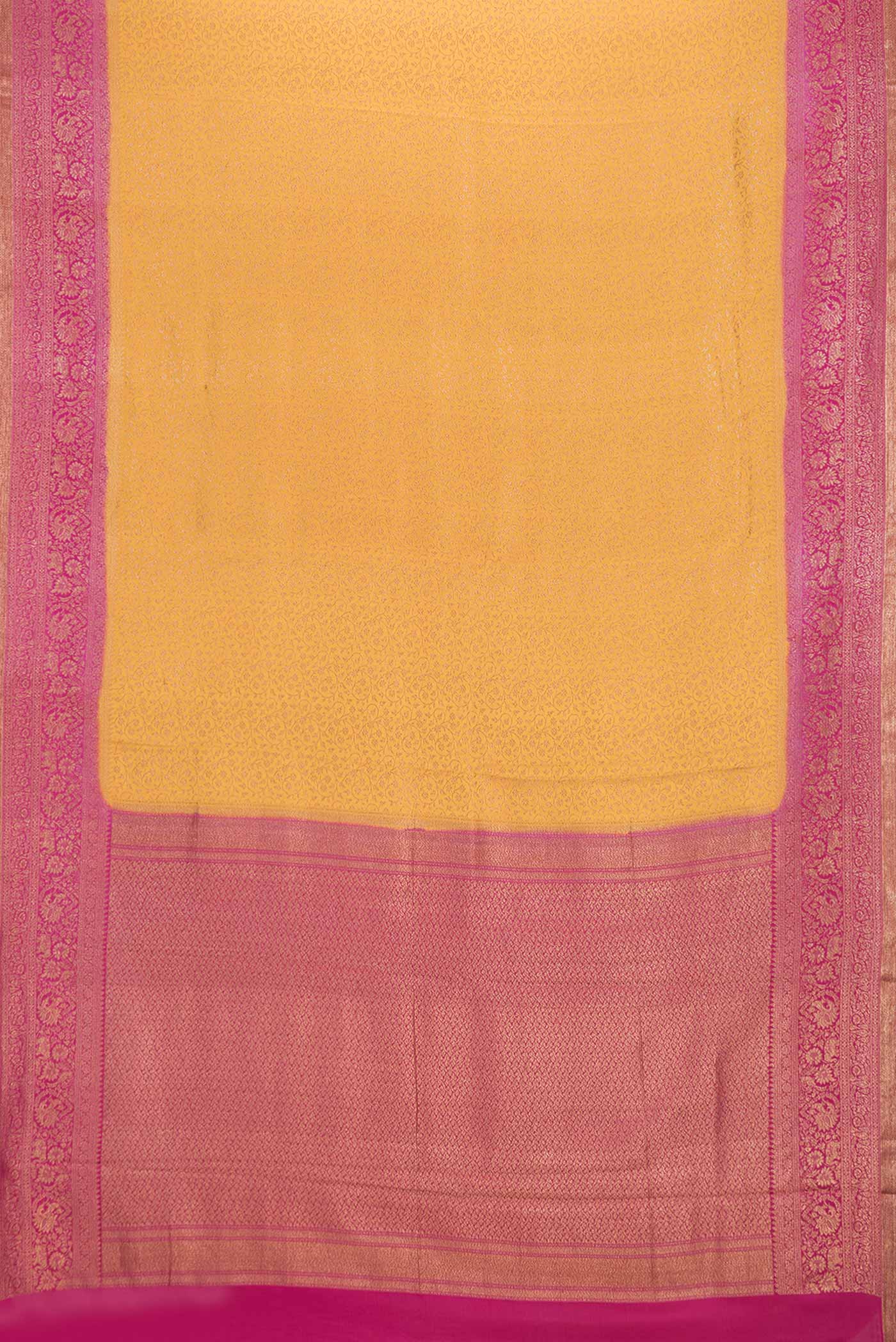 Flat view of Mustard Dual Tone Banarasi Silk Saree with Zari Brocade on the body and Zari Border. 