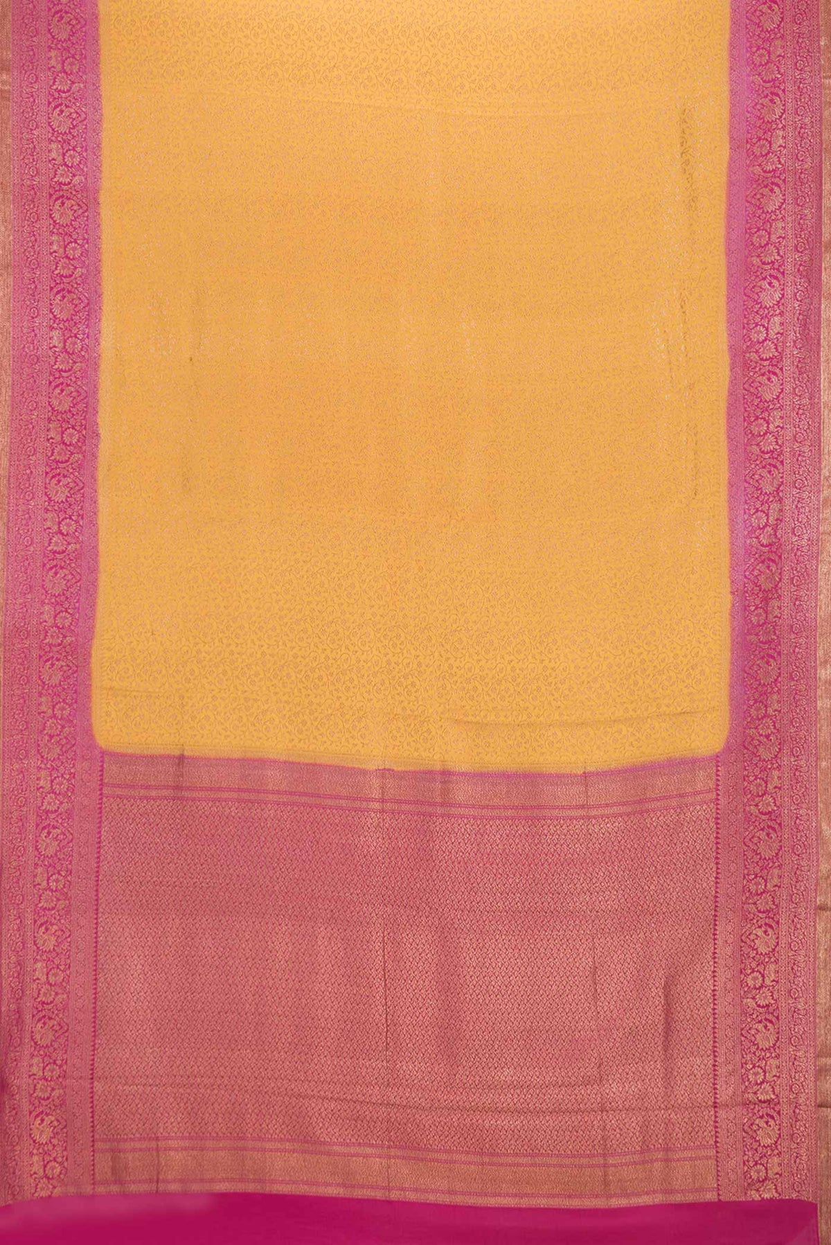 Flat view of Mustard Dual Tone Banarasi Silk Saree with Zari Brocade on the body and Zari Border. 