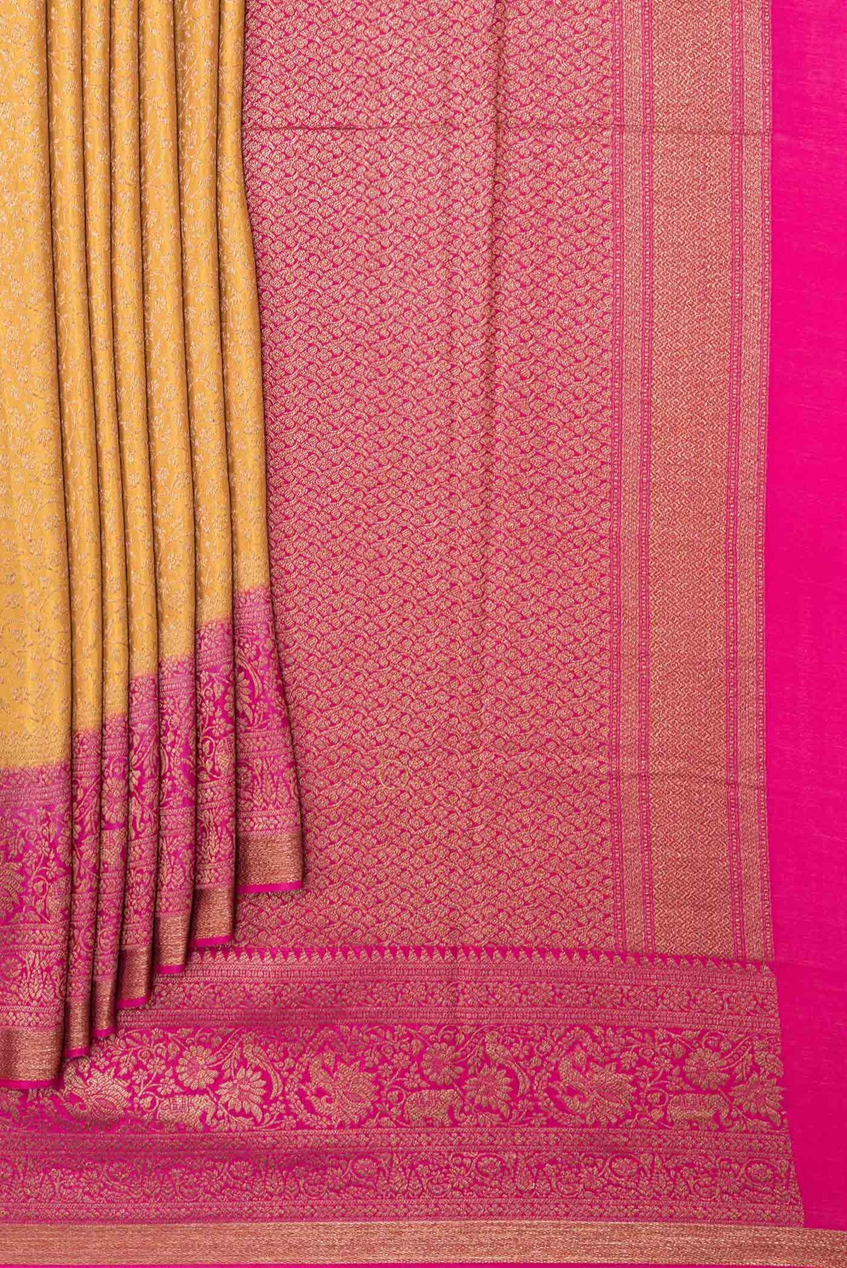 Pleats and pallu of Mustard Dual Tone Banarasi Silk Saree with Zari Brocade on the body and Zari Border. 