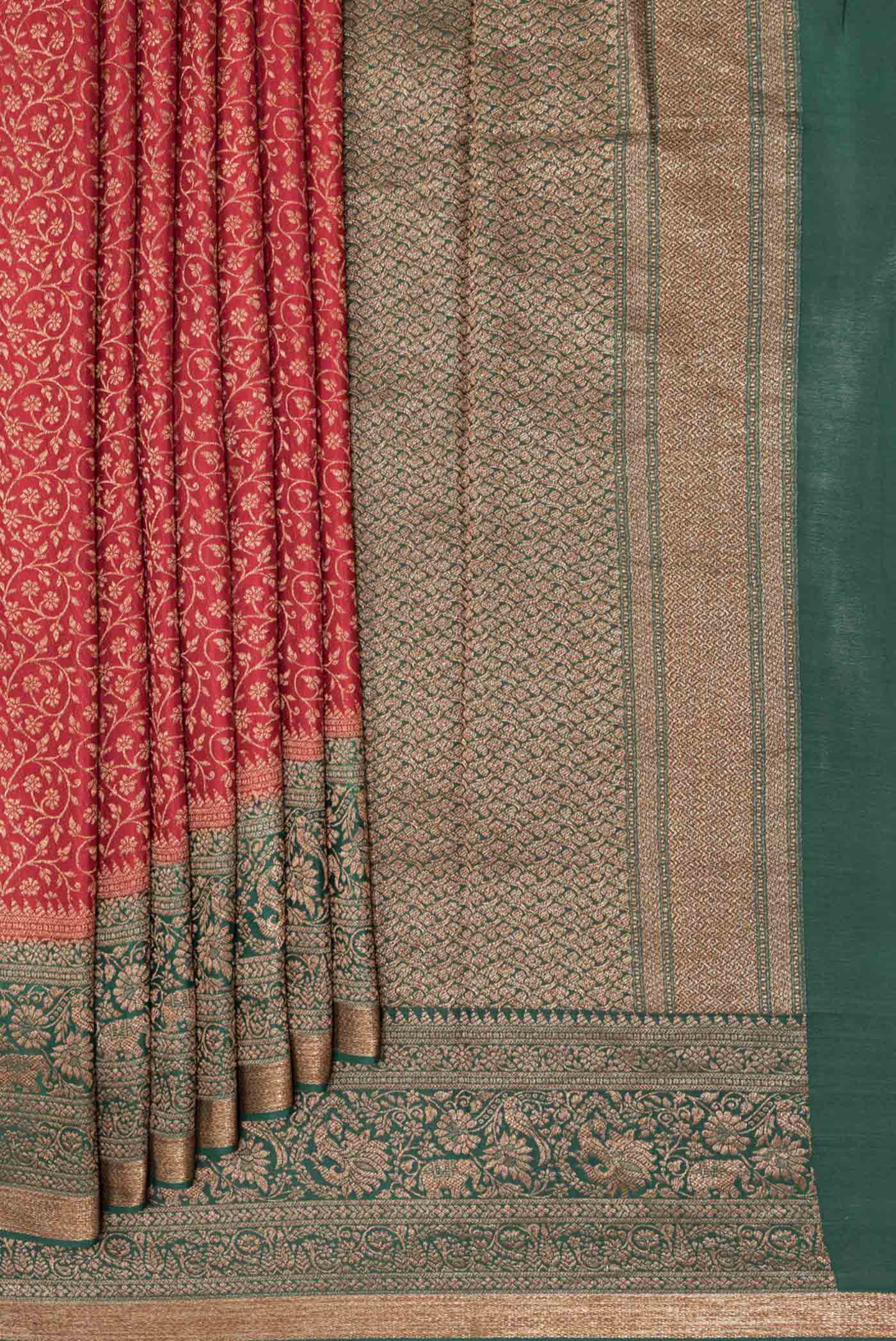 Pleats and pallu of Red Dual Tone Banarasi Georgette Saree with Zari Brocade on the body and Zari Border. 