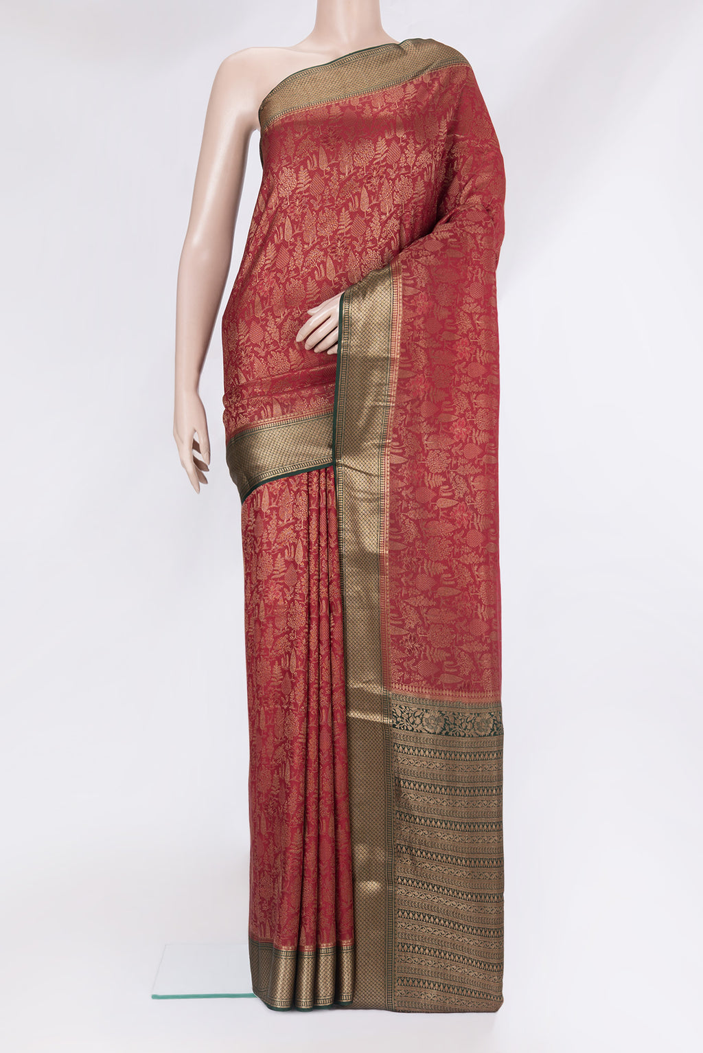 Maroon Banarasi Georgette Saree with Zari Brocade on the body and Zari Border.  displayed on a mannequin