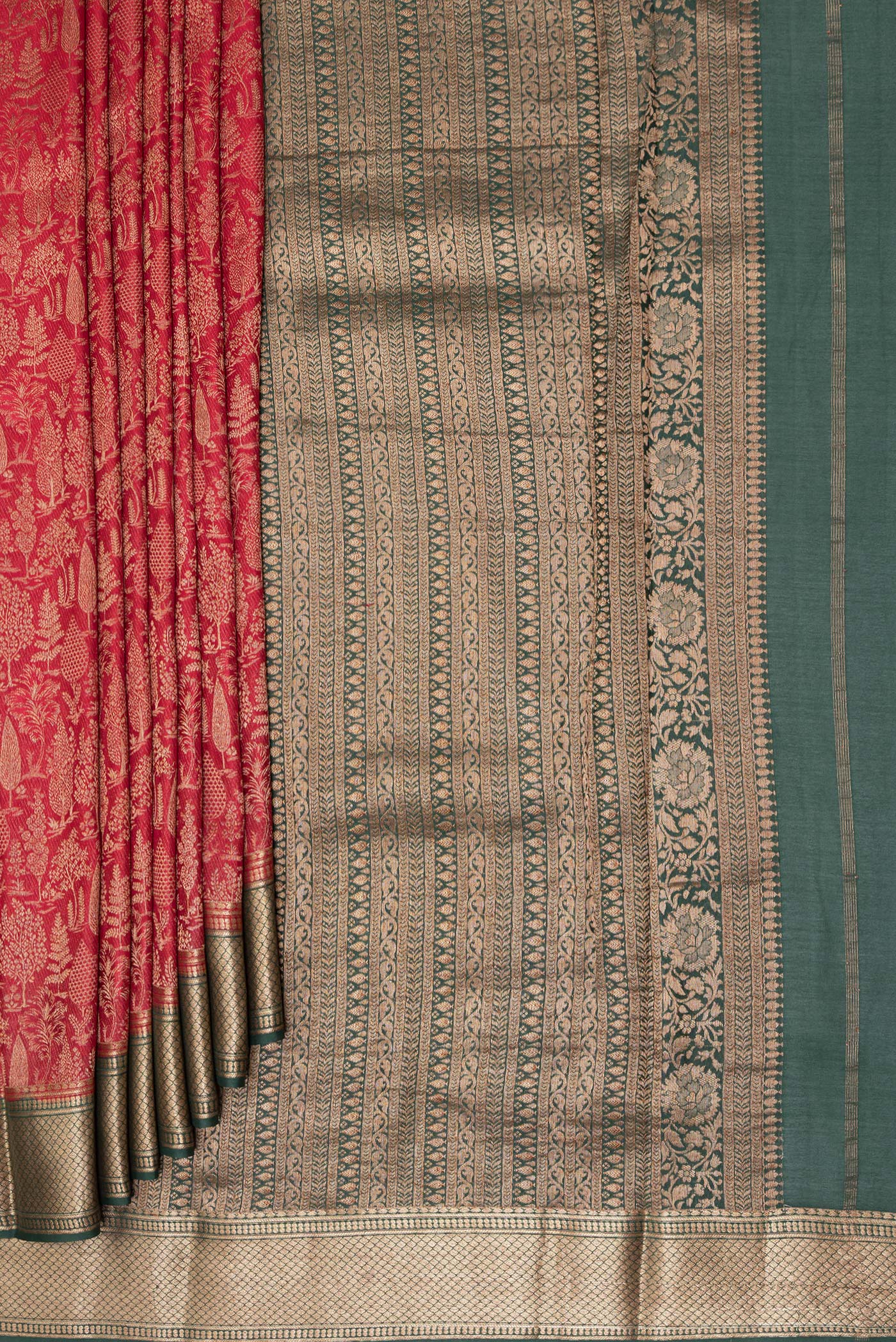 Pleats and pallu of Maroon Banarasi Georgette Saree with Zari Brocade on the body and Zari Border. 