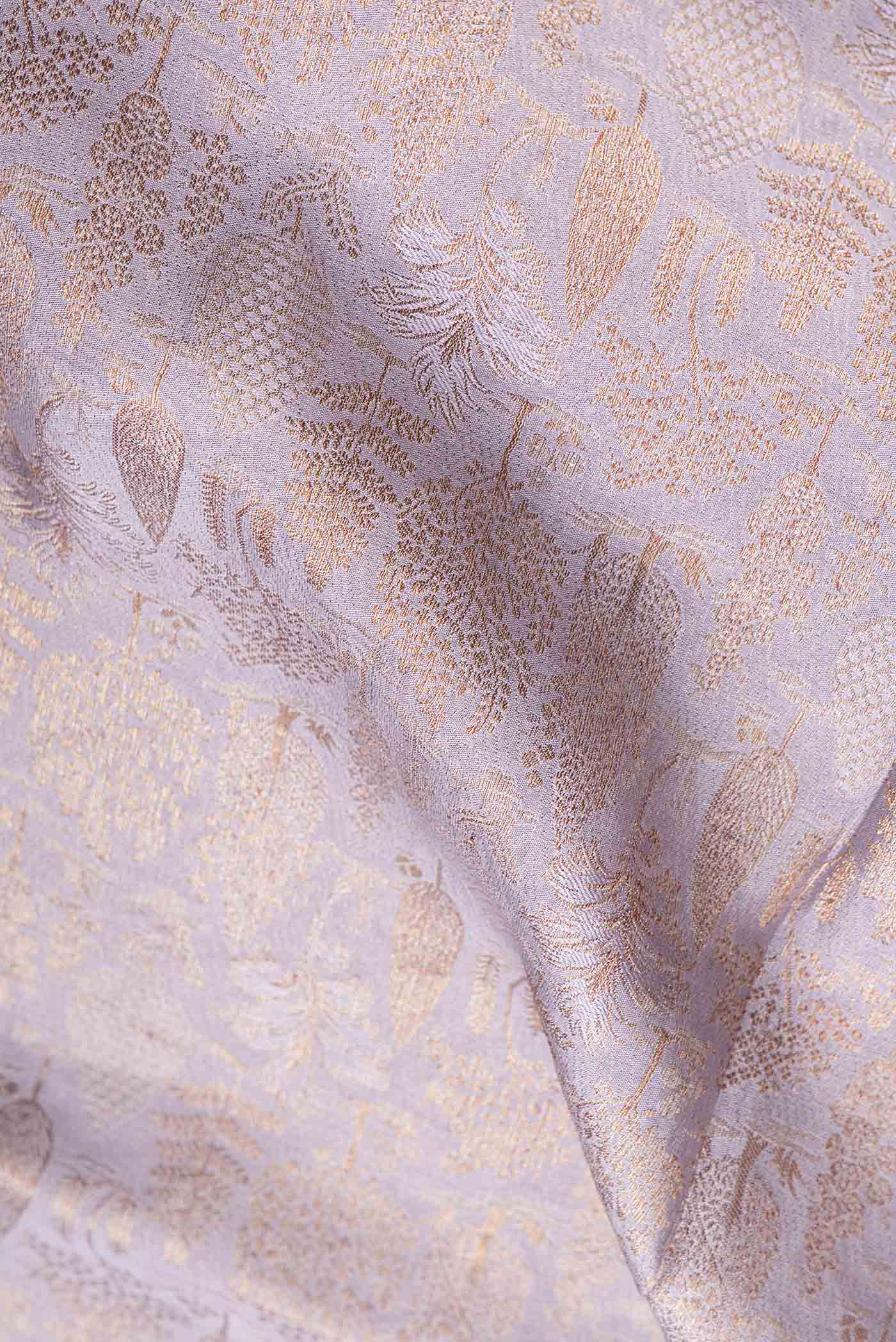Close up of Lavender Dual Tone Banarasi Georgette Saree with Zari Brocade on the body and Zari Border.  displaying folds