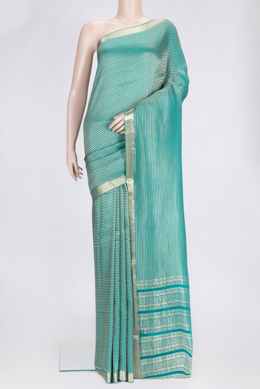 Sky Blue Dual Tone Banarasi Georgette Saree with Zari Brocade on the body and Zari Border.  displayed on a mannequin
