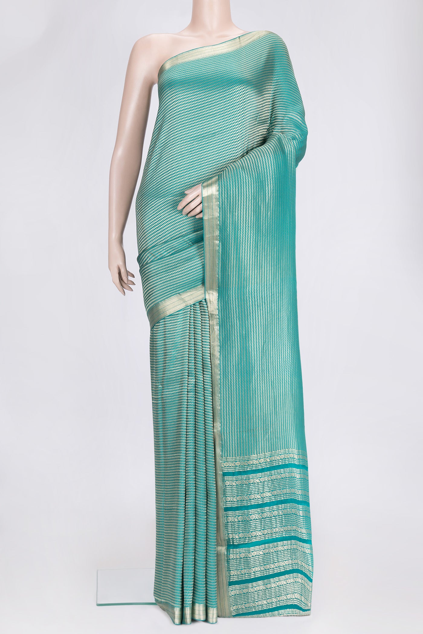 Sky Blue Dual Tone Banarasi Georgette Saree with Zari Brocade on the body and Zari Border.  displayed on a mannequin