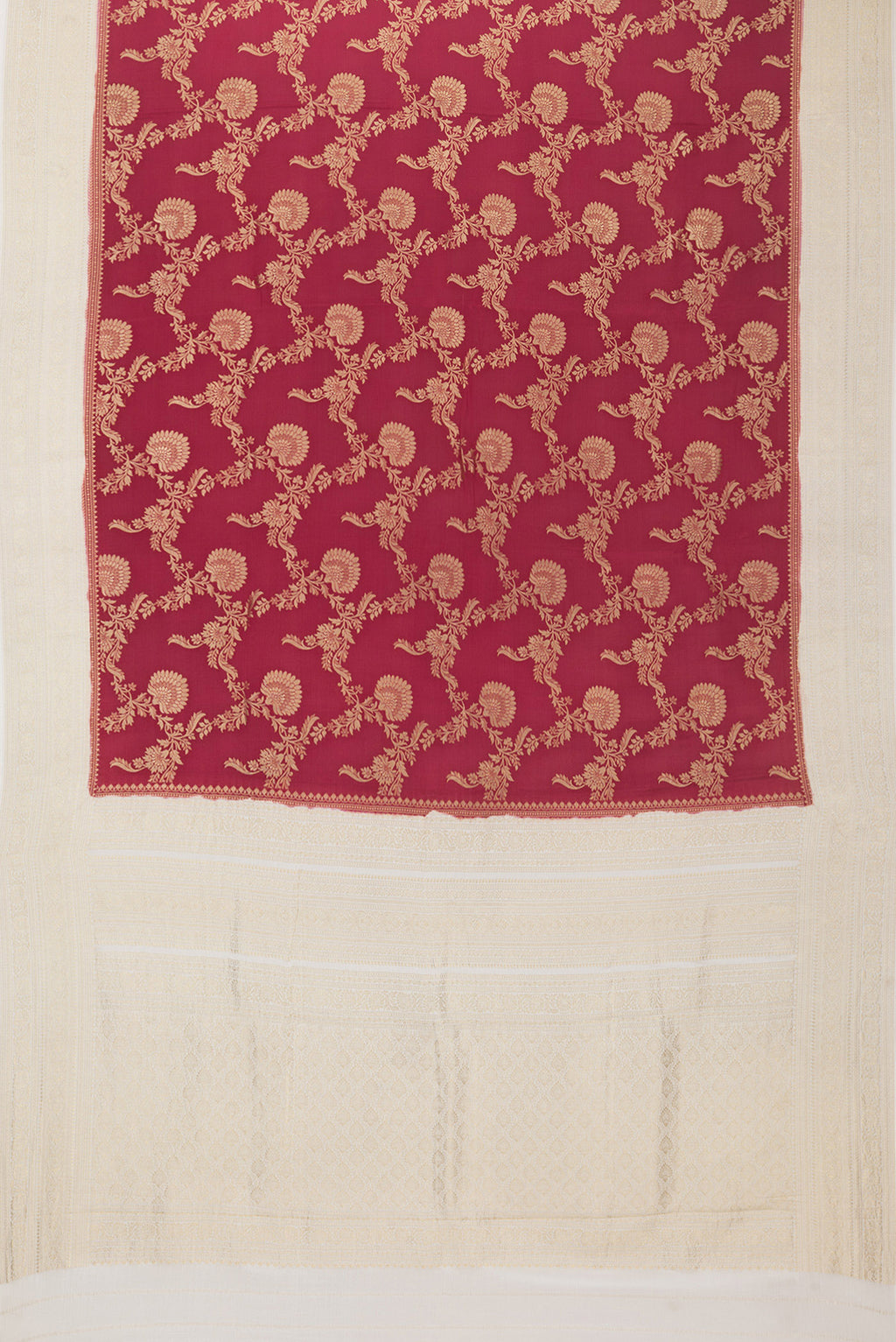Flat view of Deep Red Crepe Saree with Zari Brocade on the body and Zari Border. 