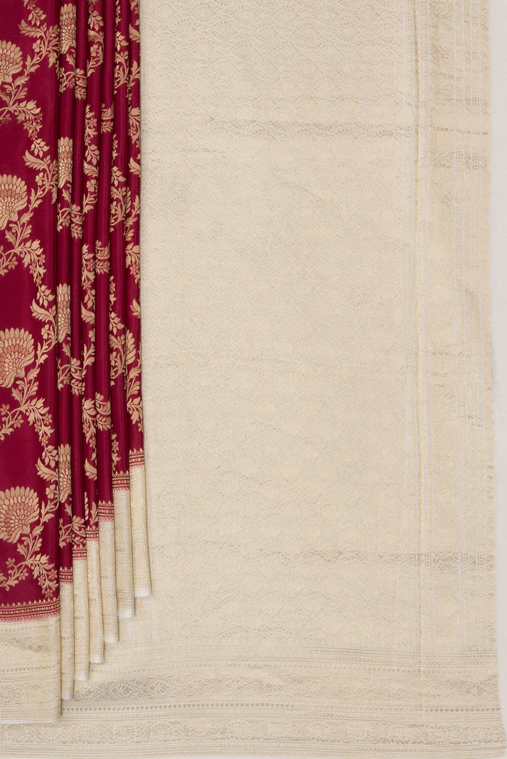 Pleats and pallu of Deep Red Crepe Saree with Zari Brocade on the body and Zari Border. 