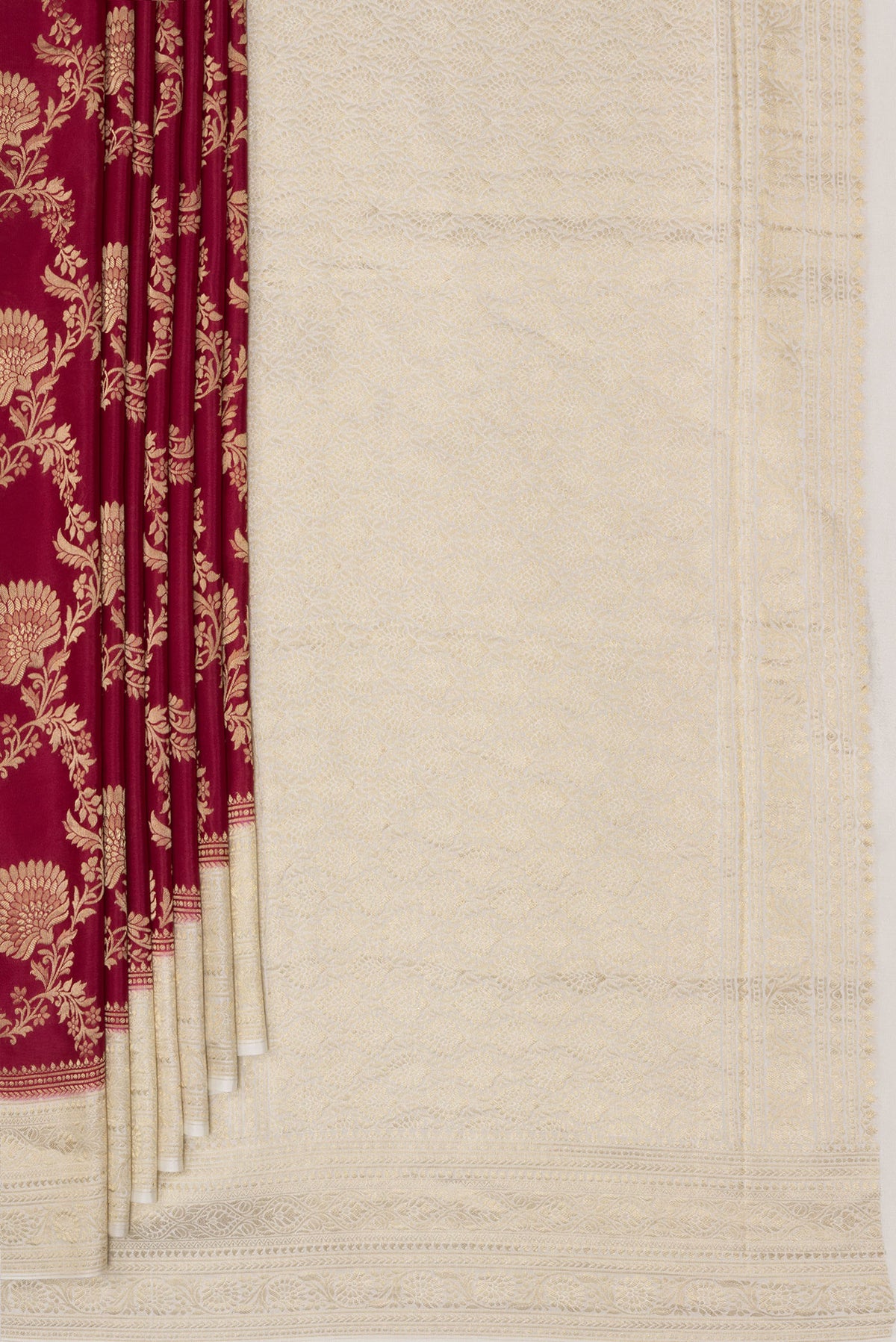 Pleats and pallu of Deep Red Crepe Saree with Zari Brocade on the body and Zari Border. 