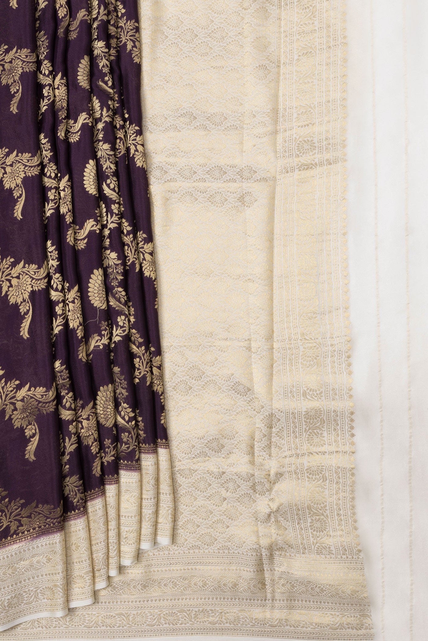 Pleats and pallu of Burgundy Dual Tone Mysore Georgette Saree with Zari Brocade on the body and Zari Border. 