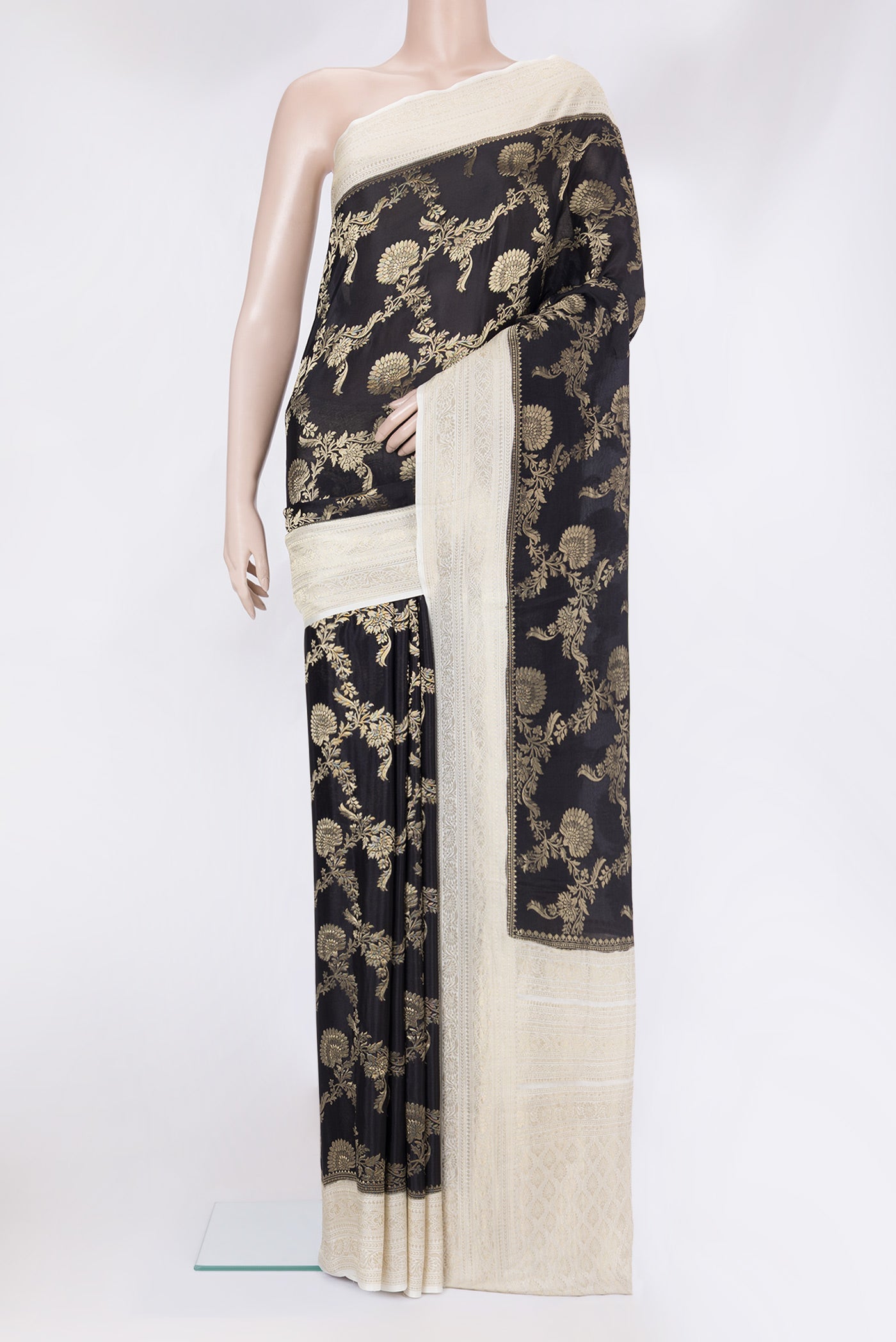 Black Banarasi Georgette Saree with Zari Brocade on the body and Zari Border.  displayed on a mannequin