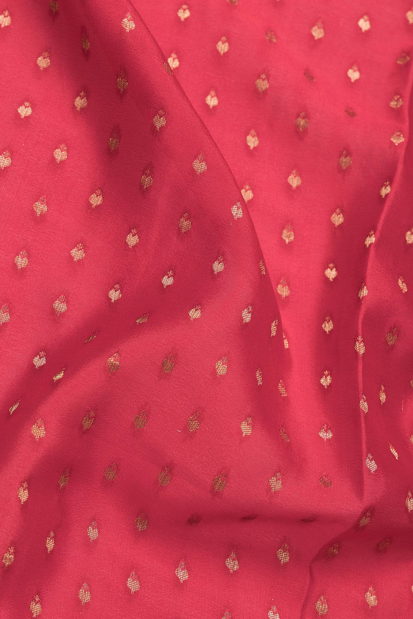 Close up of Red Dual Tone Banarasi Georgette Saree with Zari Brocade on the body and Zari Border.  displaying folds