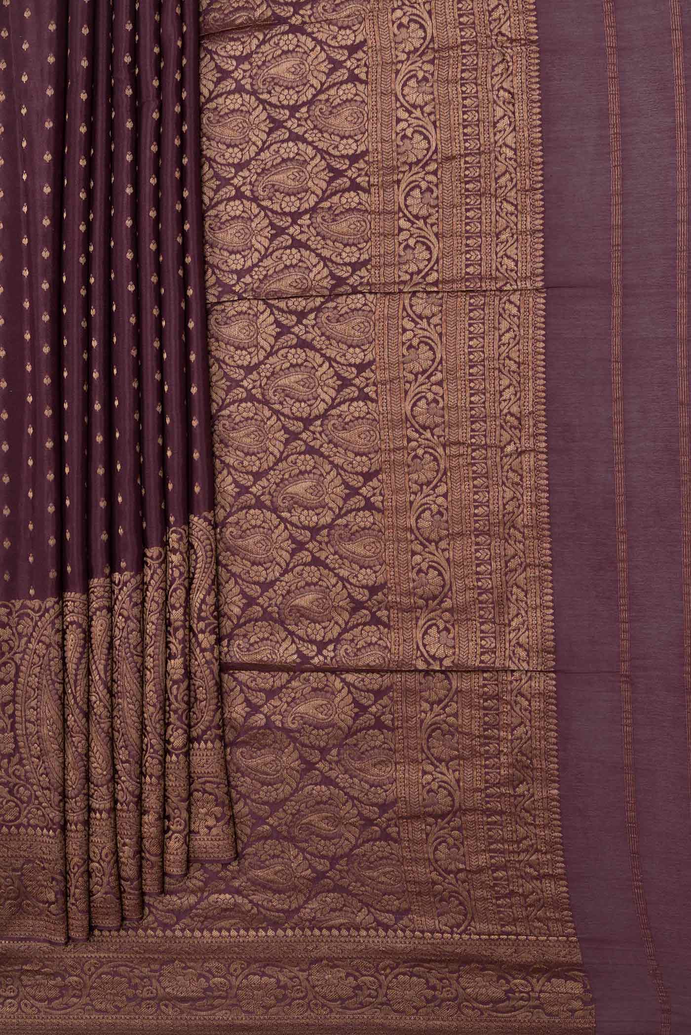 Pleats and pallu of Brown Dual Tone Banarasi Silk Saree with Zari Butta on the body and Zari Border. 