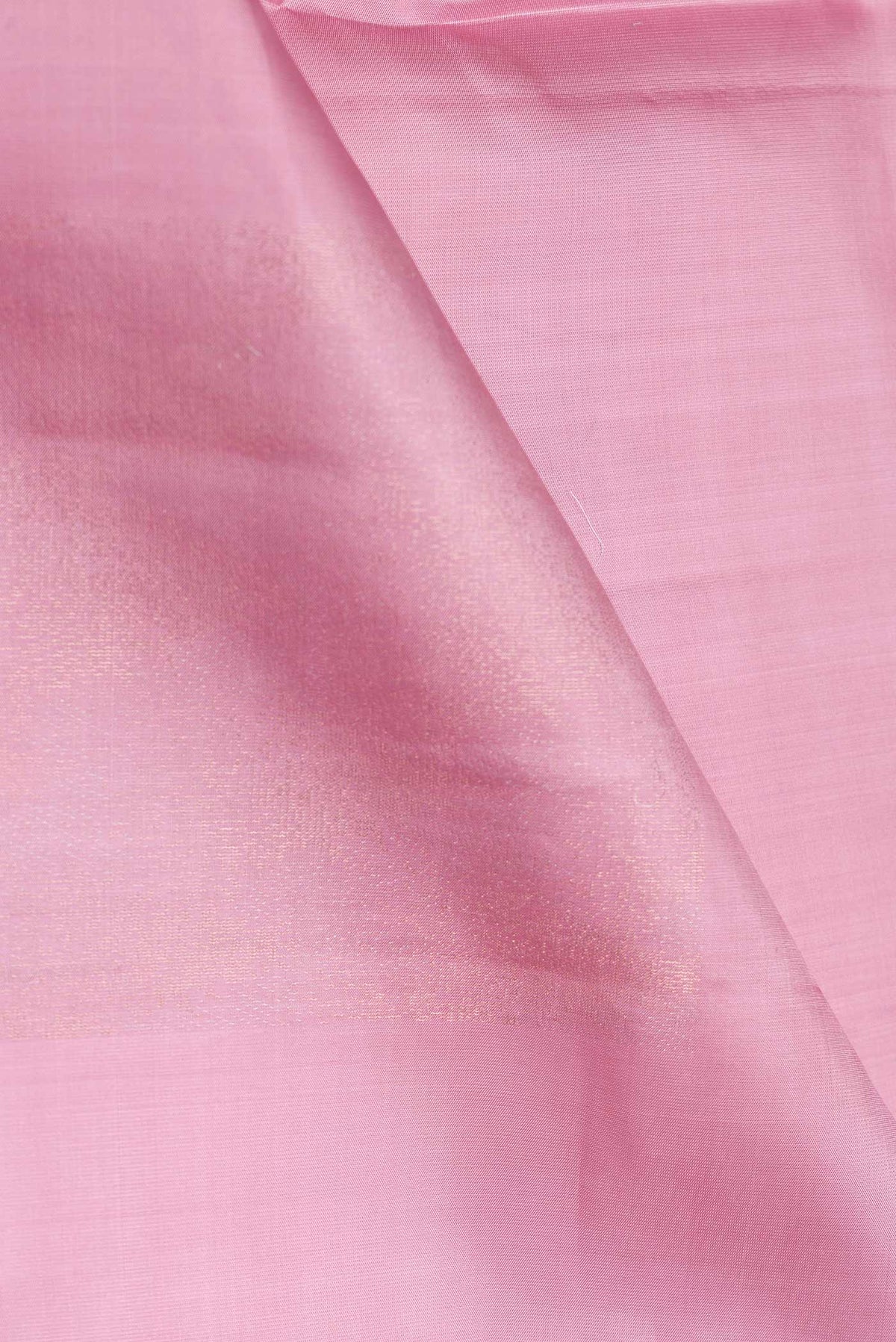 Close up of Pink Dual Tone Soft Silk Saree with Zari Butta on the body and Without Border.  displaying folds