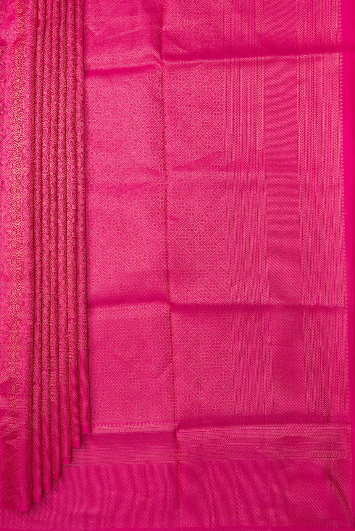 Pleats and pallu of Pure Silk Dark Pink Soft Saree with Zari Brocade on the body and Fancy Border. 