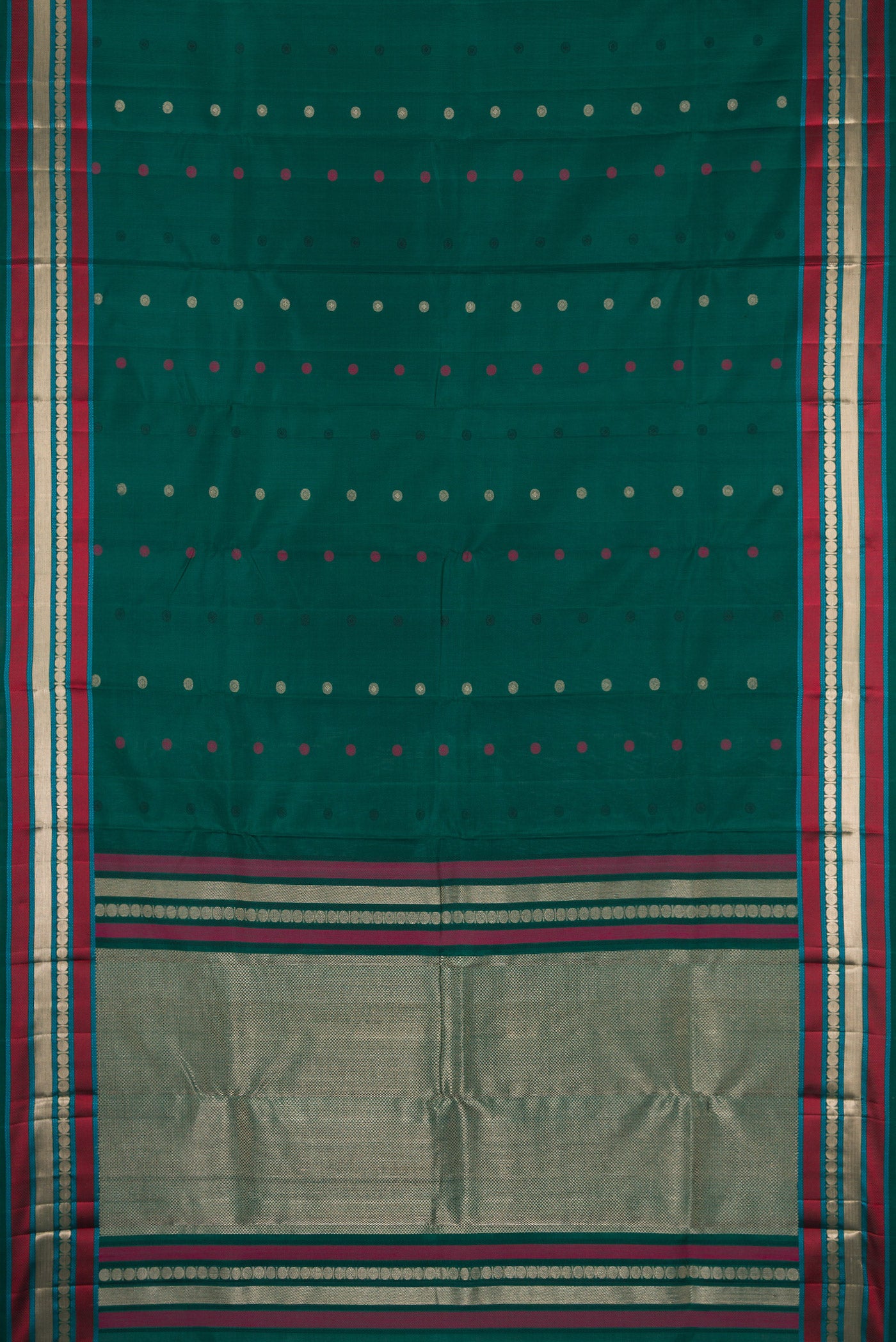 Flat view of Bottle Green Kanchipuram Silk Saree with Zari And Thread Butta on the body and Zari And Thread Border. 