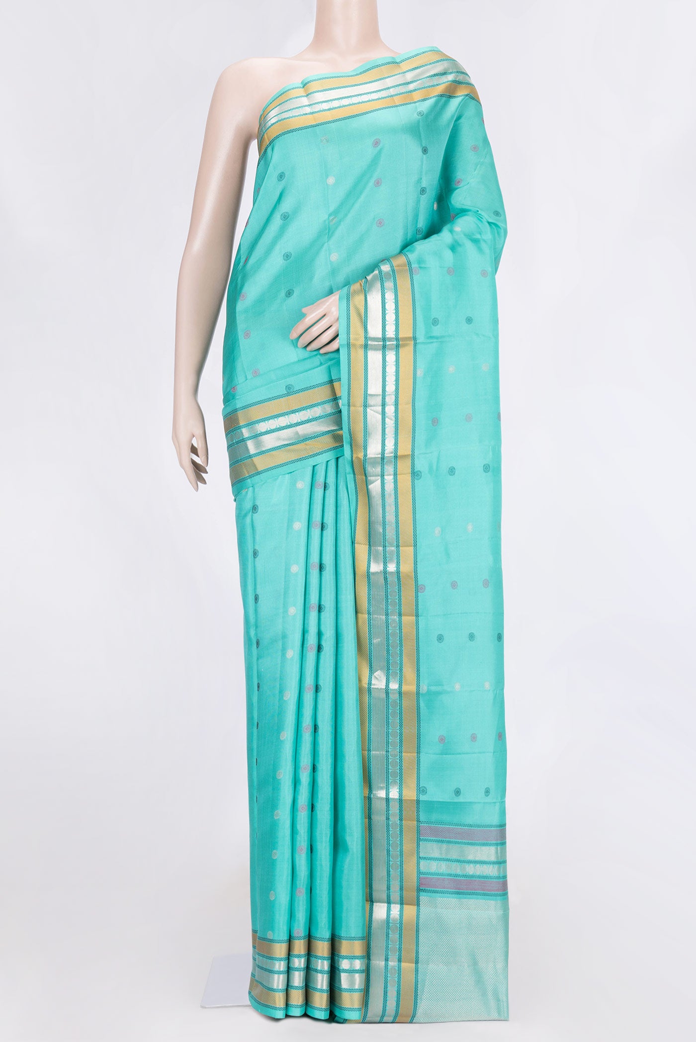 Sea Green Dual Tone Kanchipuram Silk Saree with Zari And Thread Butta on the body and Zari And Thread Border.  displayed on a mannequin