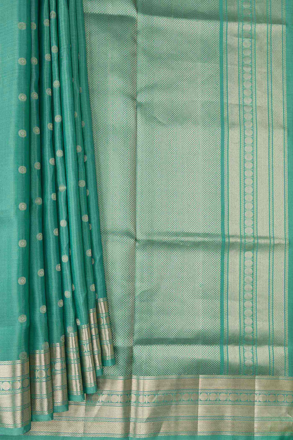 Pleats and pallu of Green Dual Tone Soft Silk Saree with Zari Butta on the body and Zari Border. 