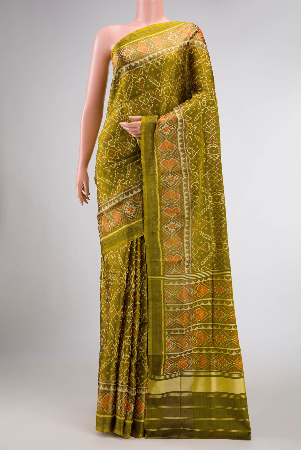 Mehandi Green Dual Tone Rajkot Patola Silk Saree with Ikat Print on the body and Ikat Border displayed on a mannequin