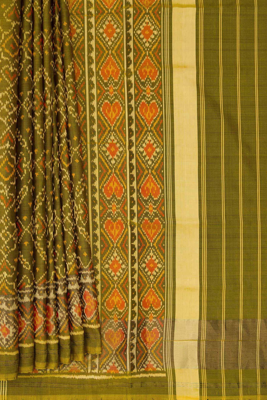 Pleats and pallu of Mehandi Green Dual Tone Rajkot Patola Silk Saree with Ikat Print on the body and Ikat Border