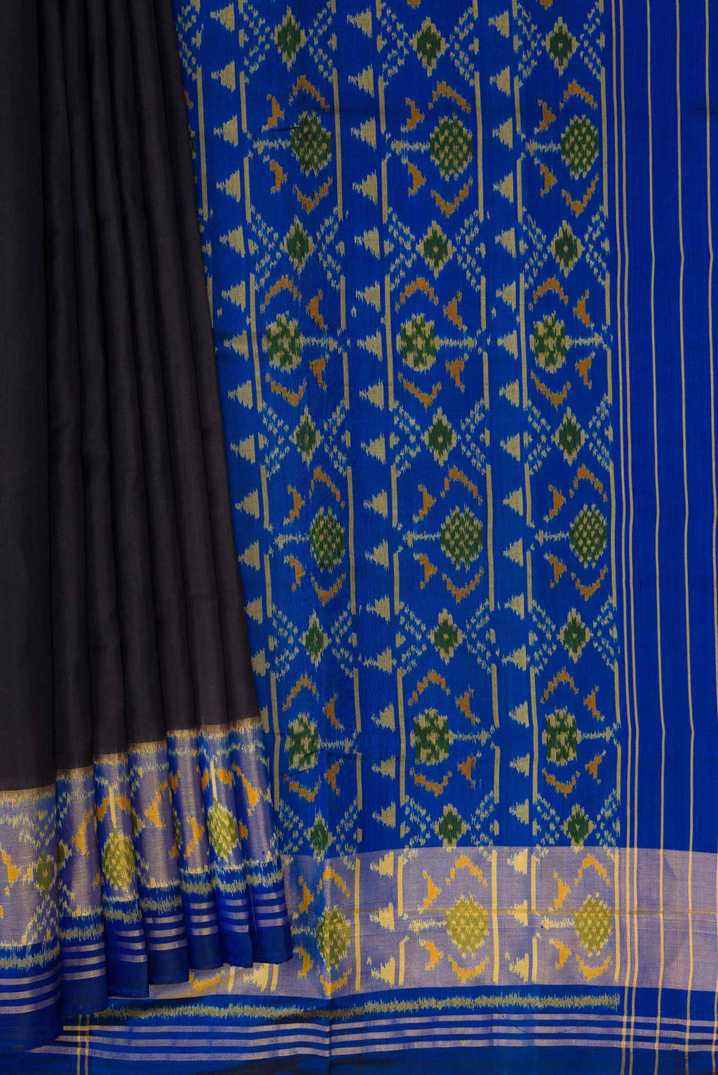 Pleats and pallu of Black Dual Tone Rajkot Patola Silk Saree with Plain Body and Ikat Border