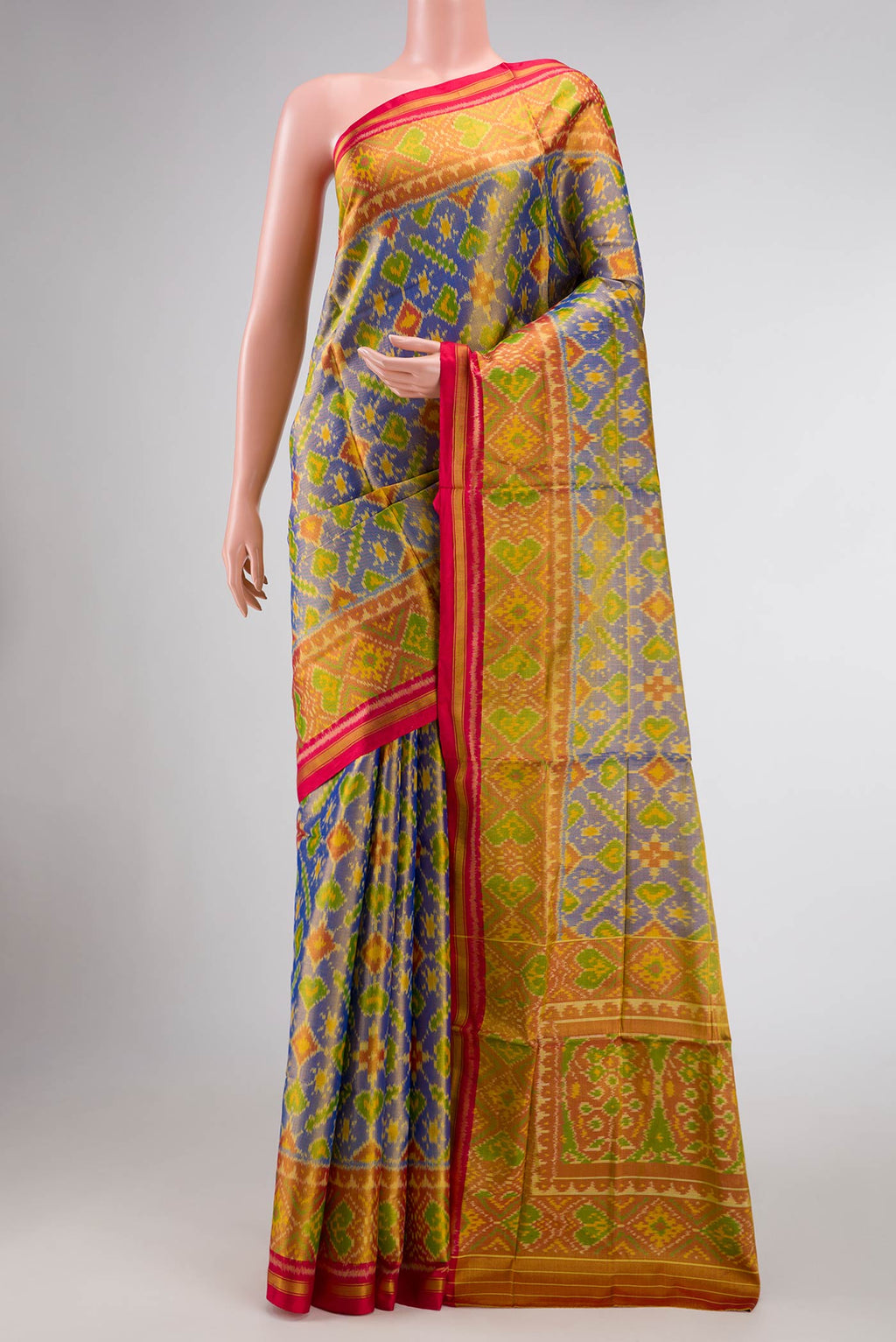 Lavender Dual Tone Rajkot Patola Silk Saree with Ikat Print on the body and Ikat Border displayed on a mannequin