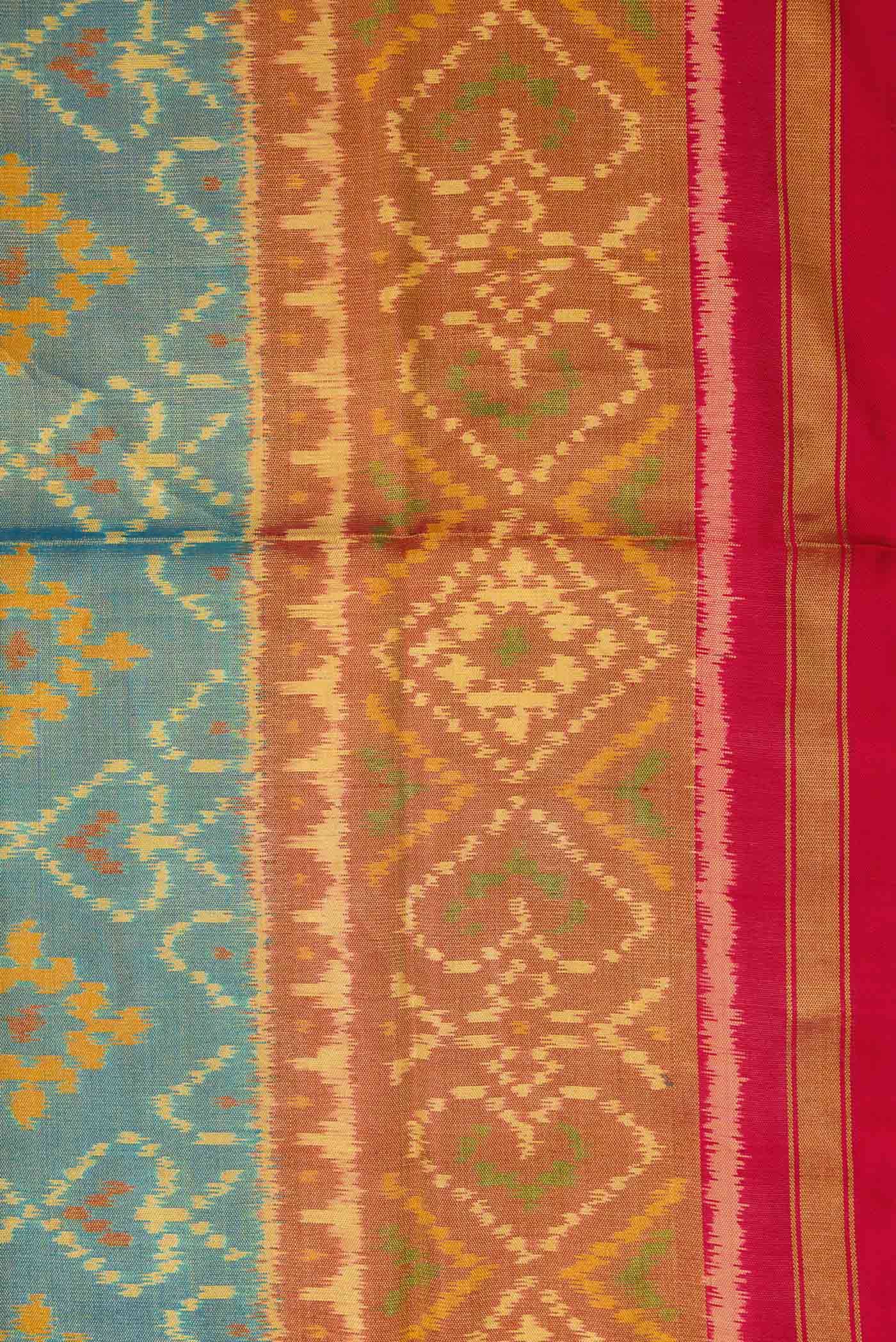 Border image of Light Blue Dual Tone Rajkot Patola Silk Saree with Ikat Print on the body and Zari Border