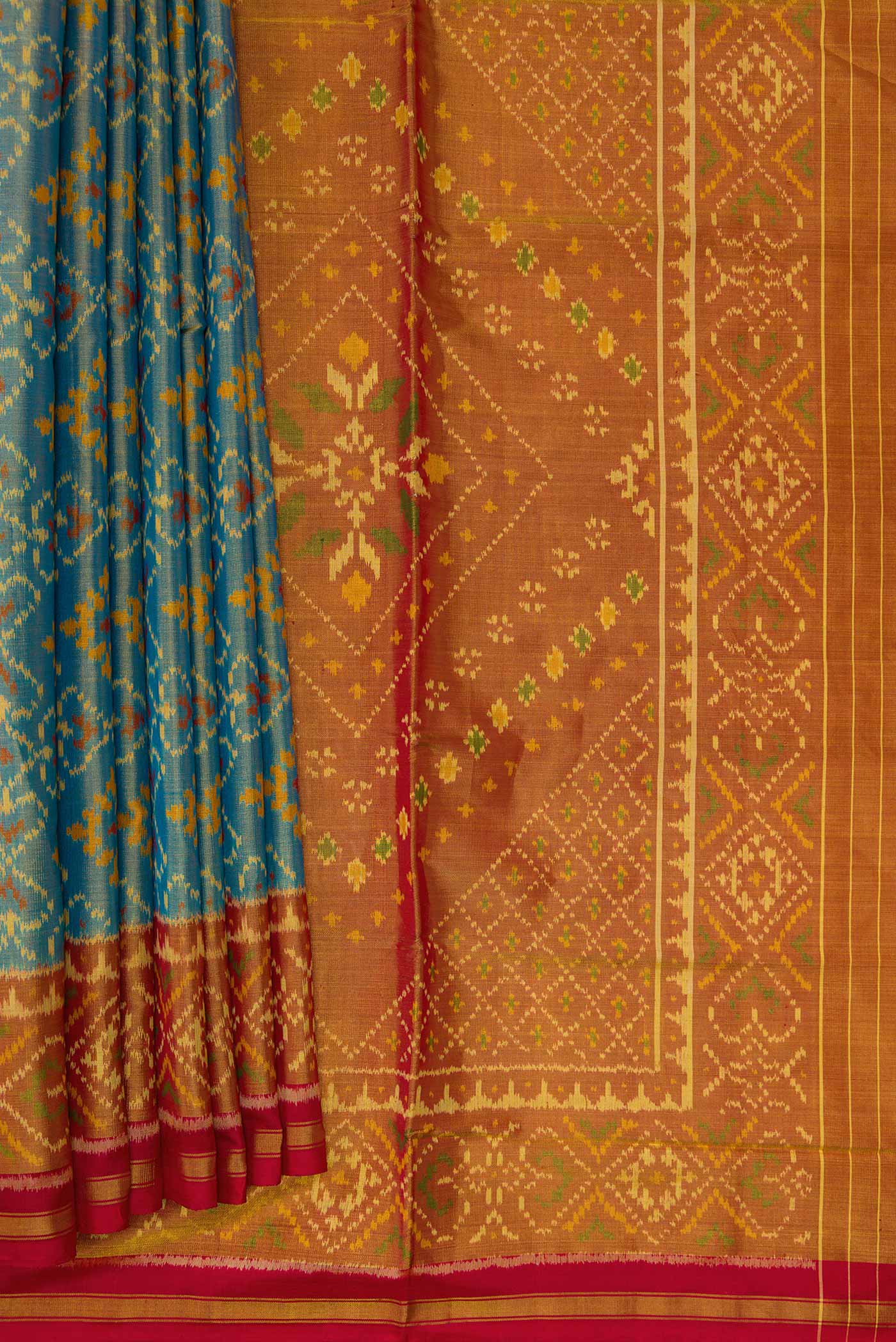 Pleats and pallu of Light Blue Dual Tone Rajkot Patola Silk Saree with Ikat Print on the body and Zari Border