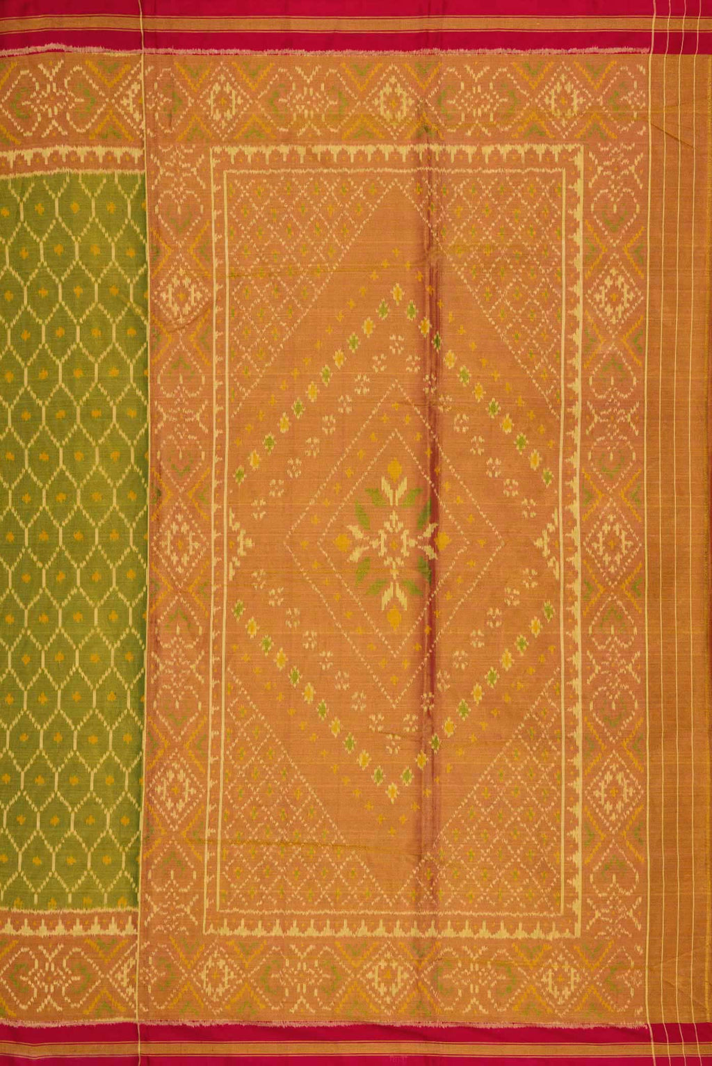 Close up image of the pallu of Mehandi Green Dual Tone Rajkot Patola Silk Saree with Ikat Print on the body and Ikat Border