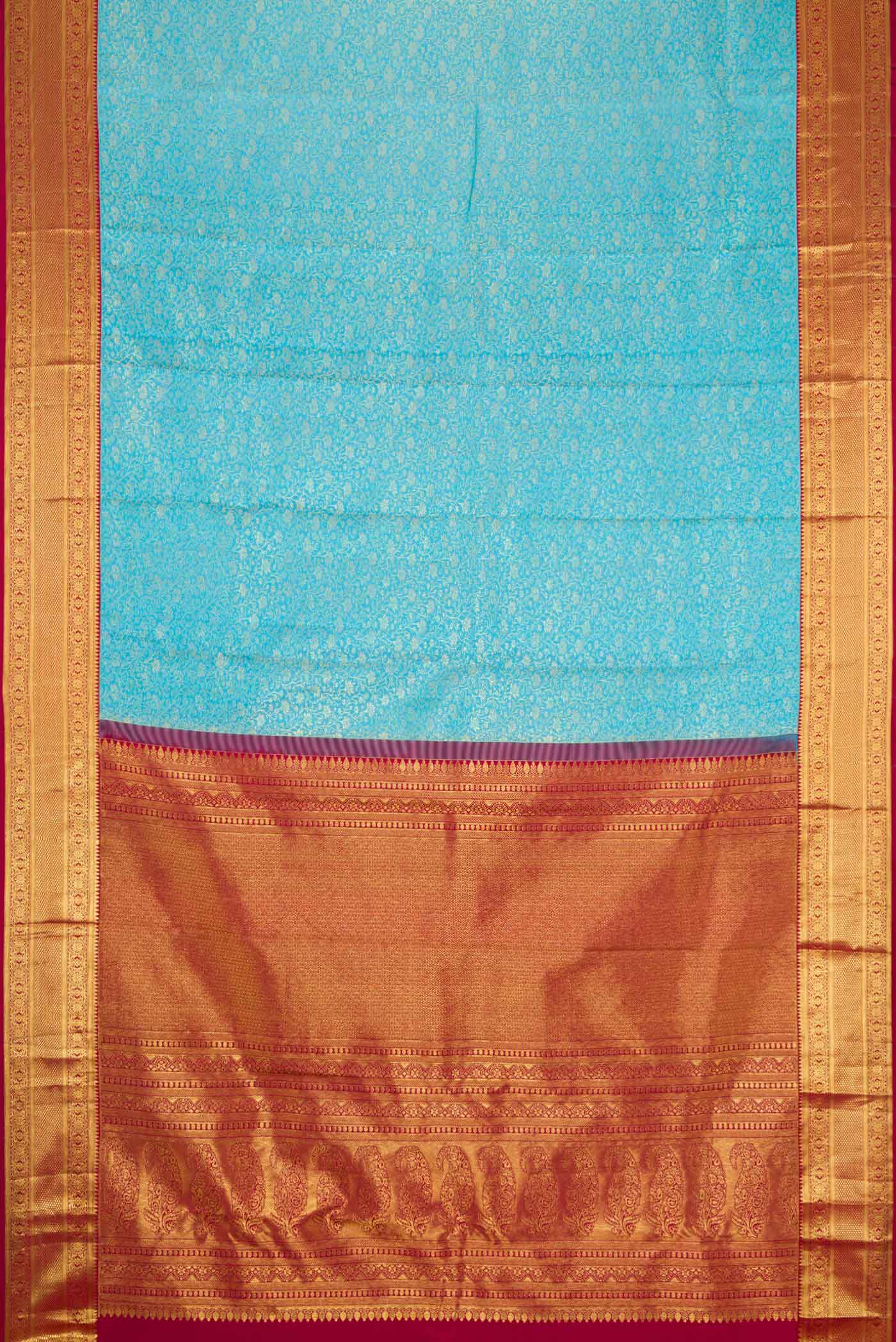 Flat view of Sky Blue Dual Tone Kanchipuram Silk Saree with Zari Brocade on the body and Zari Border. 