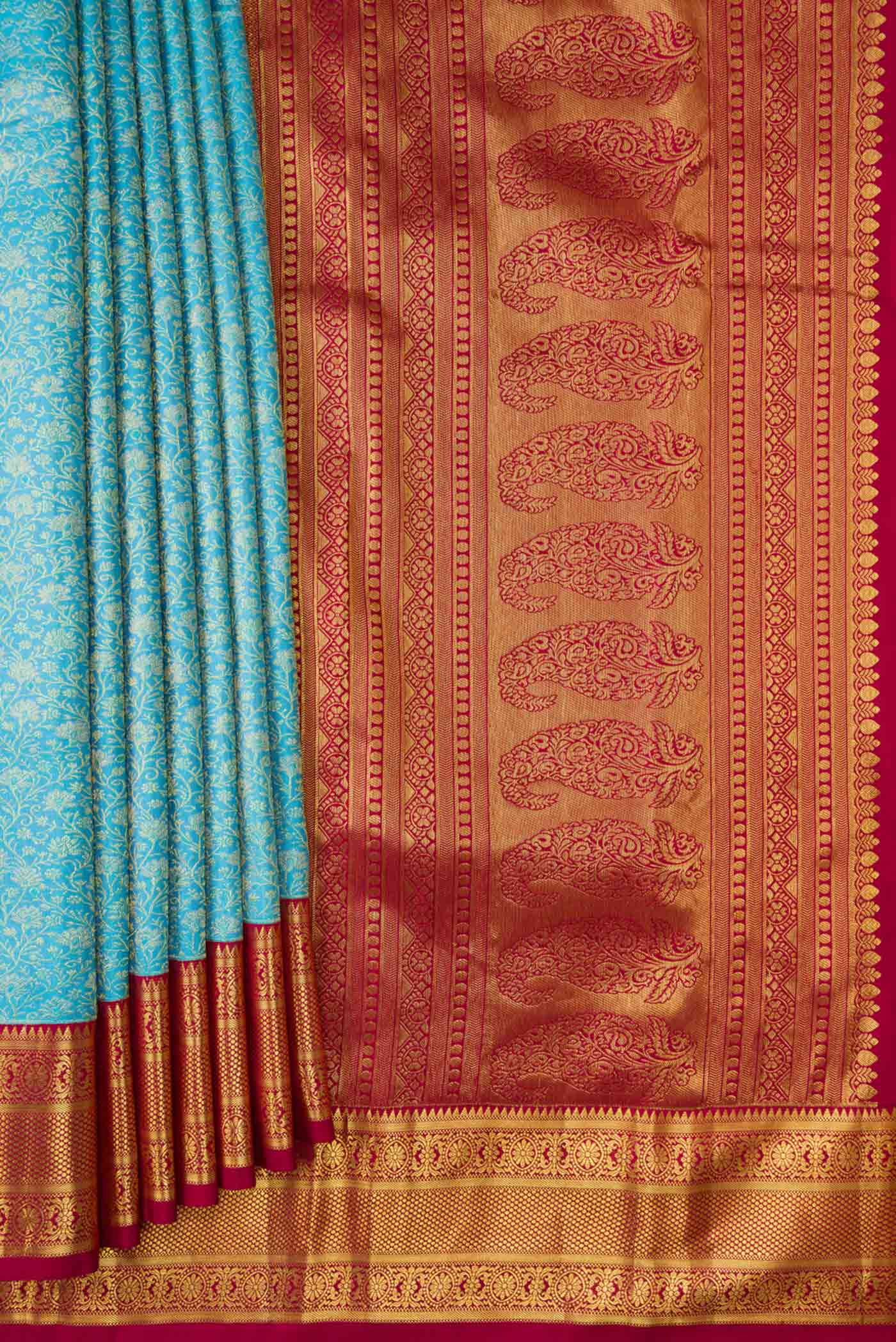 Pleats and pallu of Sky Blue Dual Tone Kanchipuram Silk Saree with Zari Brocade on the body and Zari Border. 