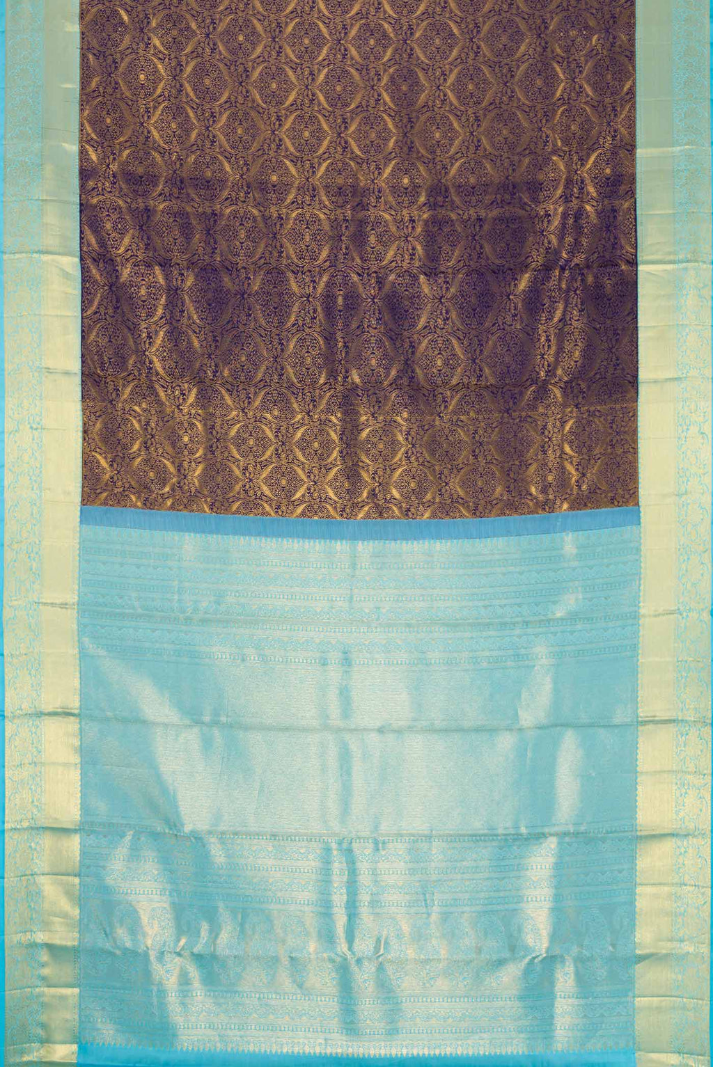 Flat view of Navy Blue Dual Tone Kanchipuram Silk Saree with Zari Brocade on the body and Zari Border. 