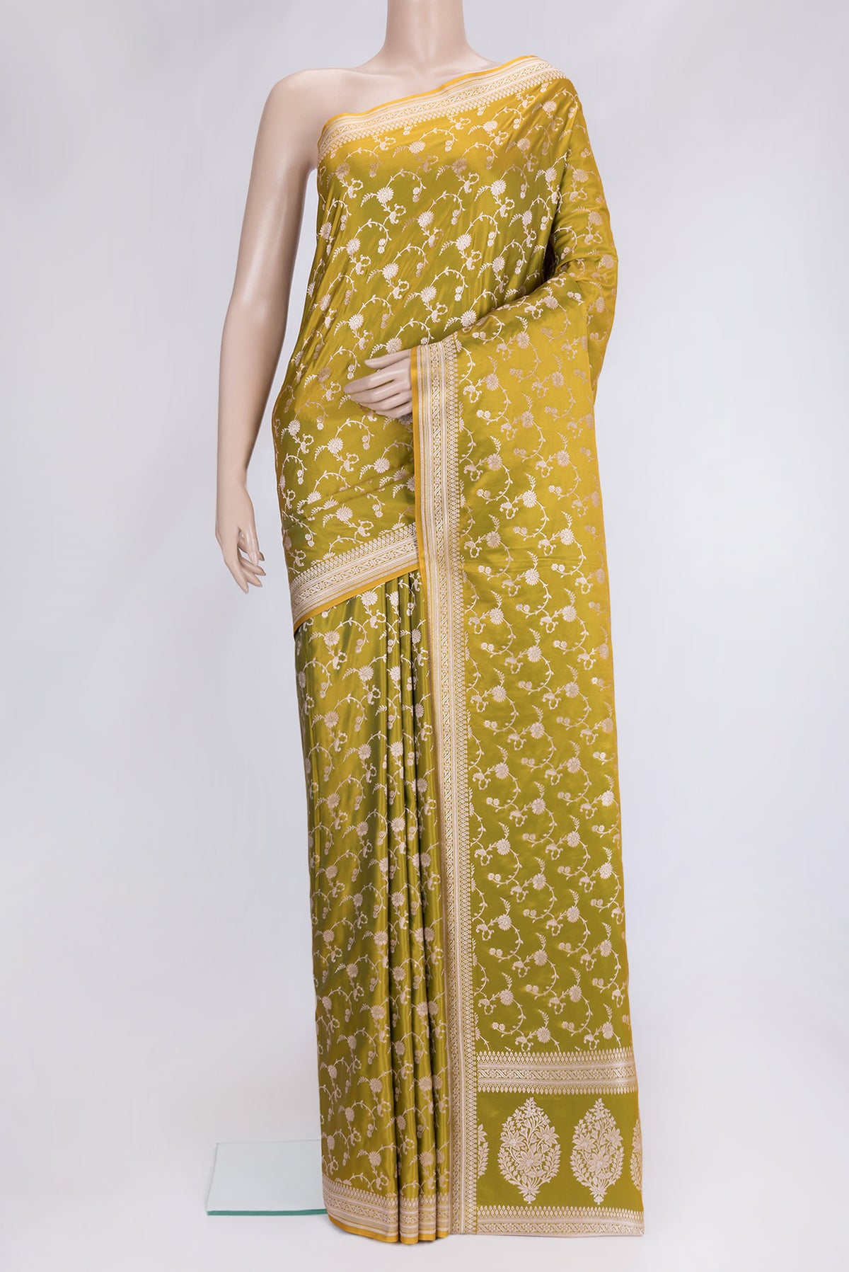 Parrot Green Dual Tone Blended Banarasi Silk Saree with Zari Brocade on the body and Zari Border.  displayed on a mannequin