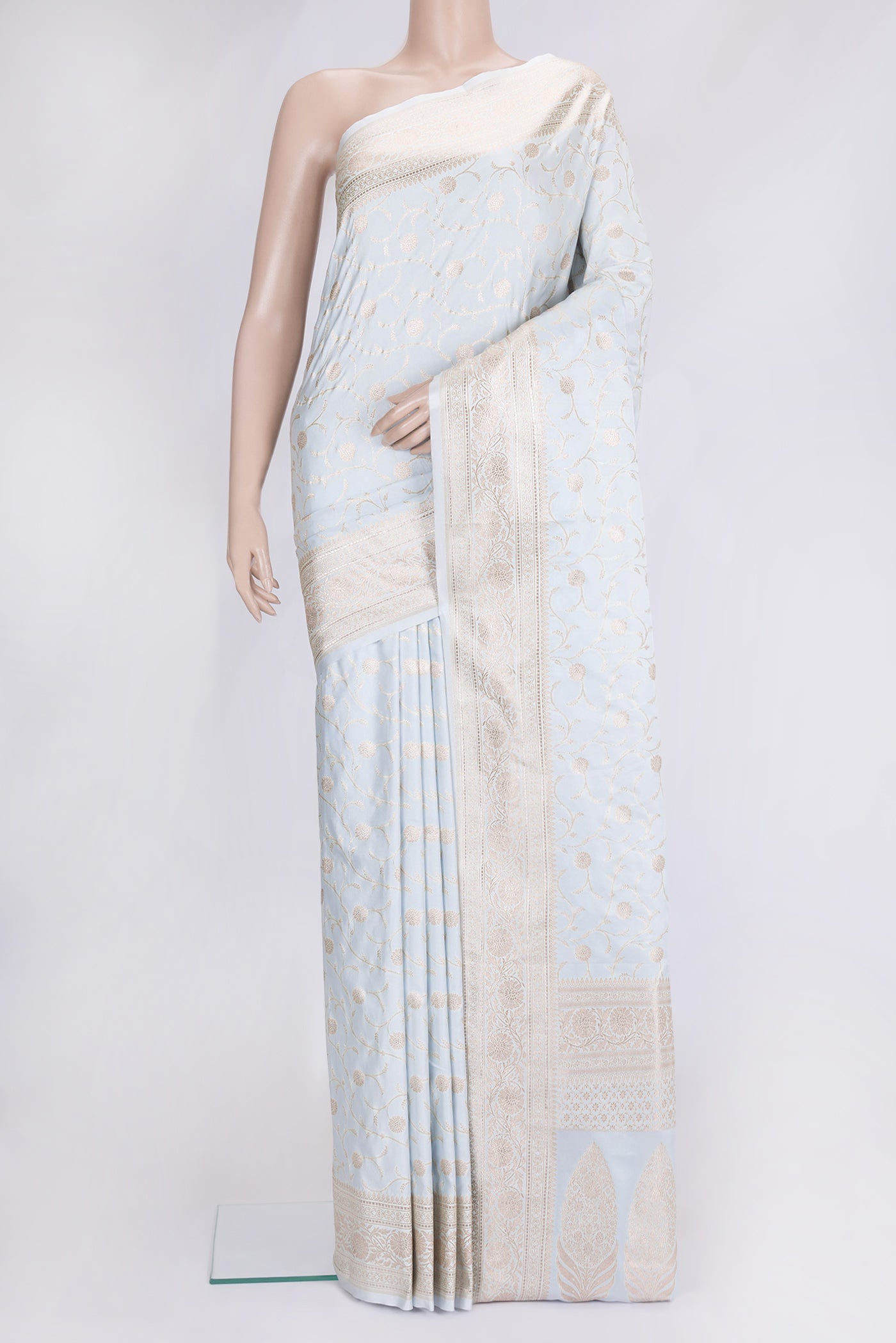 Light Blue Dual Tone Blended Banarasi Silk Saree with Zari Brocade on the body and Zari Border.  displayed on a mannequin