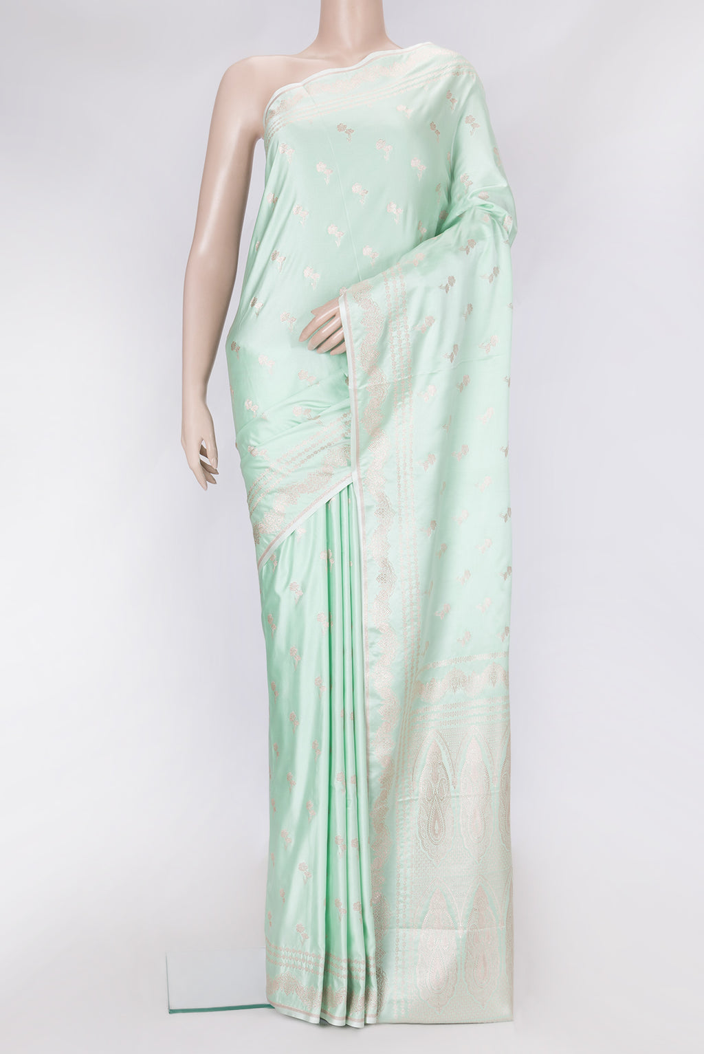 Sea Green Dual Tone Banarasi Silk Saree with Zari Butta on the body and Fancy Border.  displayed on a mannequin