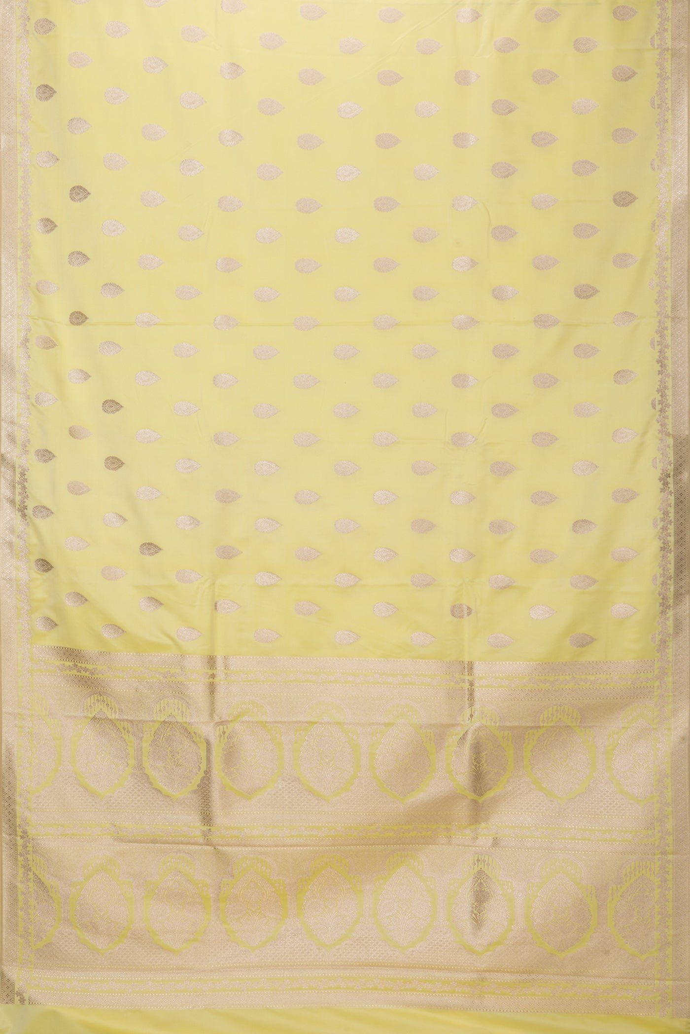 Flat view of Lemon Yellow Blended Banarasi Silk Saree with Zari Butta on the body and Zari Border. 