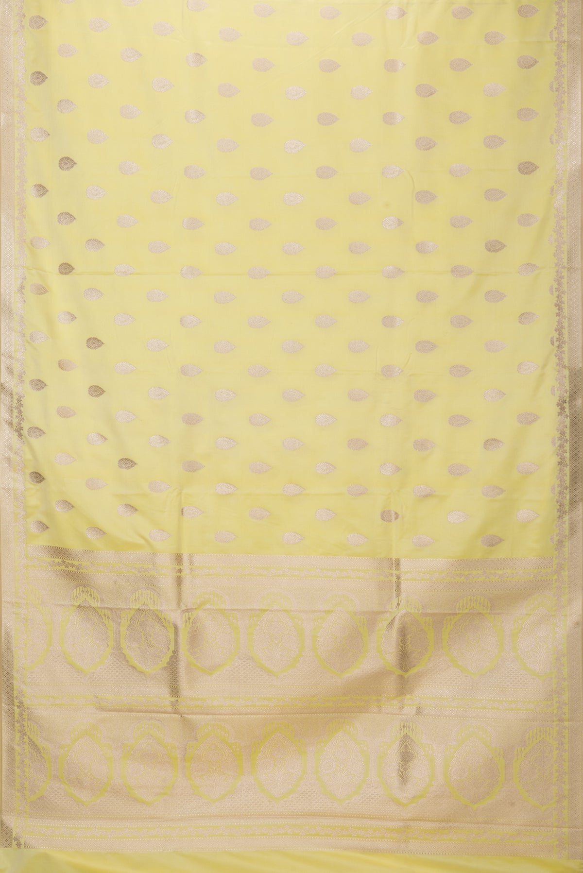 Flat view of Lemon Yellow Blended Banarasi Silk Saree with Zari Butta on the body and Zari Border. 