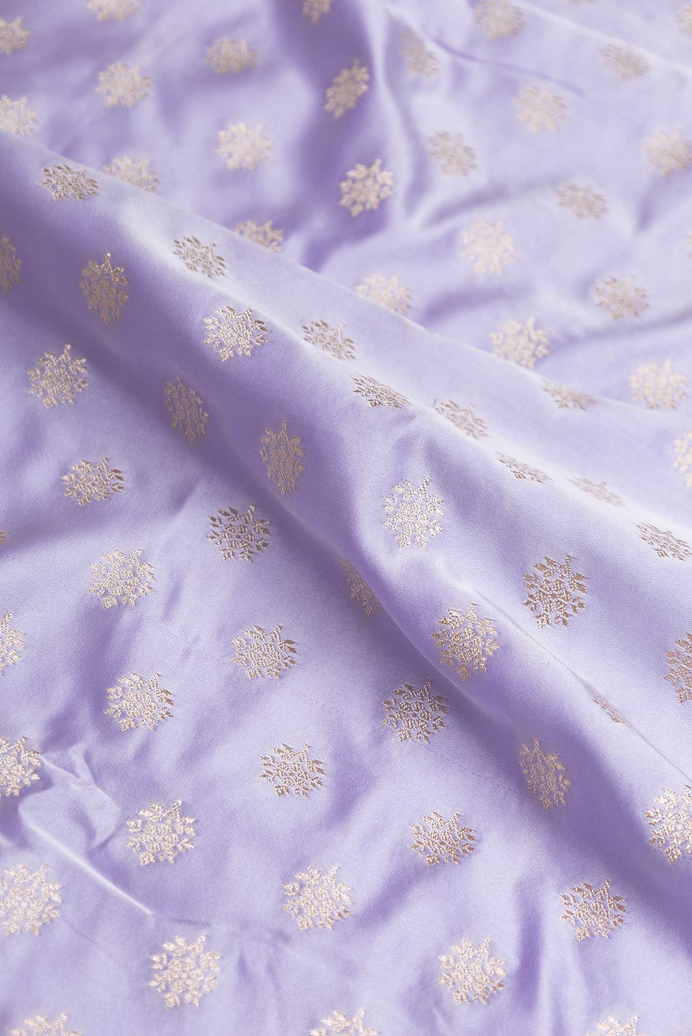 Close up of Lavender Dual Tone Blended Banarasi Silk Saree with Zari Butta on the body and Zari Border displaying folds