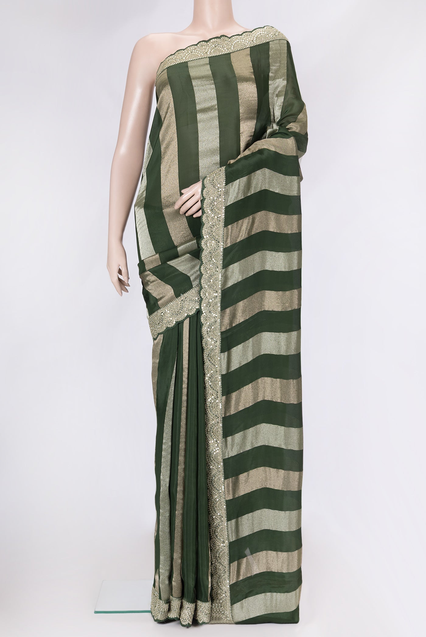 Bottle Green Dual Tone Mysore Georgette Saree with Stripes on the body and Sequin Border.  displayed on a mannequin