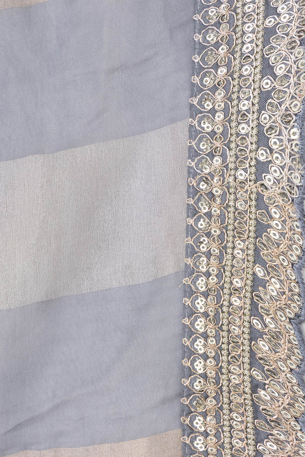 Border image of Grey Dual Tone Mysore Georgette Saree with Stripes on the body and Embroidery Border. 