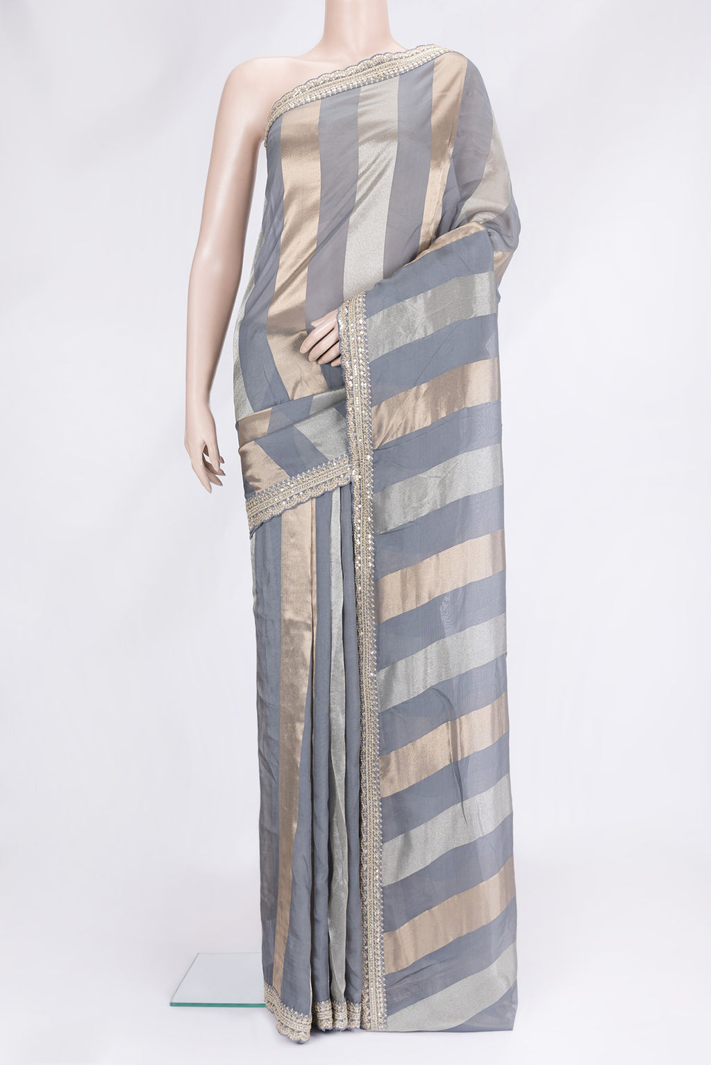 Grey Dual Tone Mysore Georgette Saree with Stripes on the body and Embroidery Border.  displayed on a mannequin